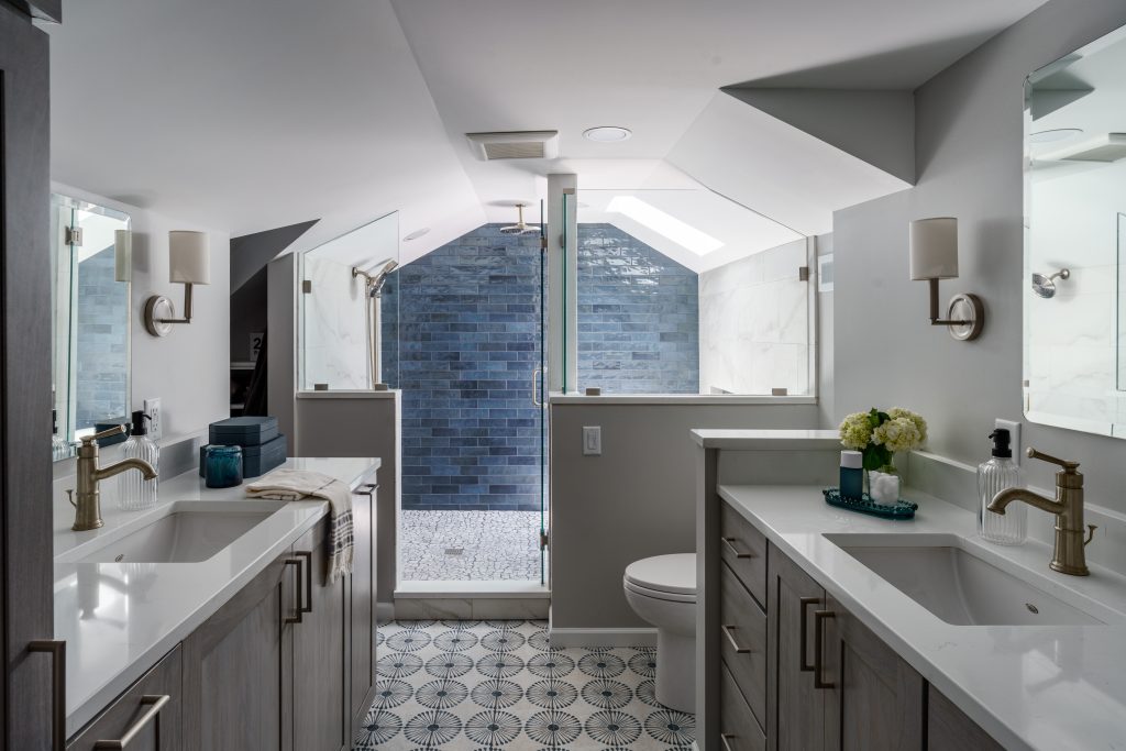 100 year old waldo home remodel primary bathroom now has a layout that flows and makes sense. with statement blue high gloss subway tile on back wall of the wet room.
