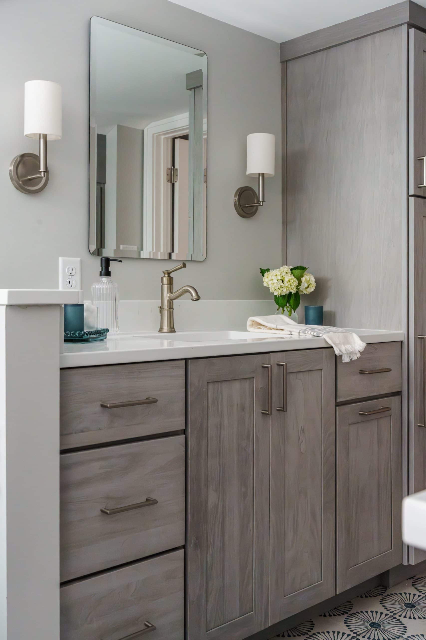 bathroom vanity details in waldo historic kcmo home remodel and refresh with cool toned grey finish oak cabinetry and modern bright design aesthetic 