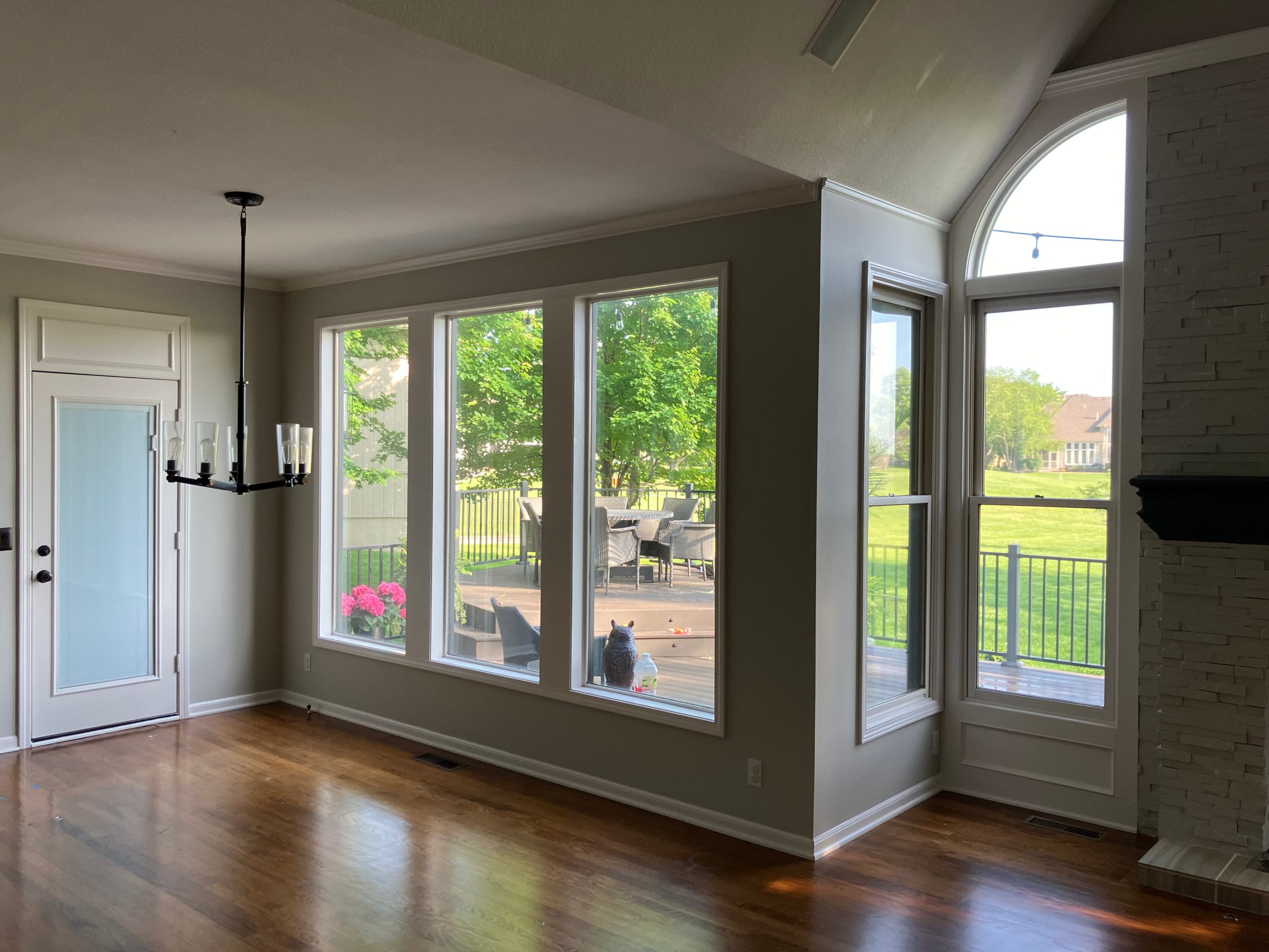 before photo of lenexa main floor with traditional and dated 1990's suburban details