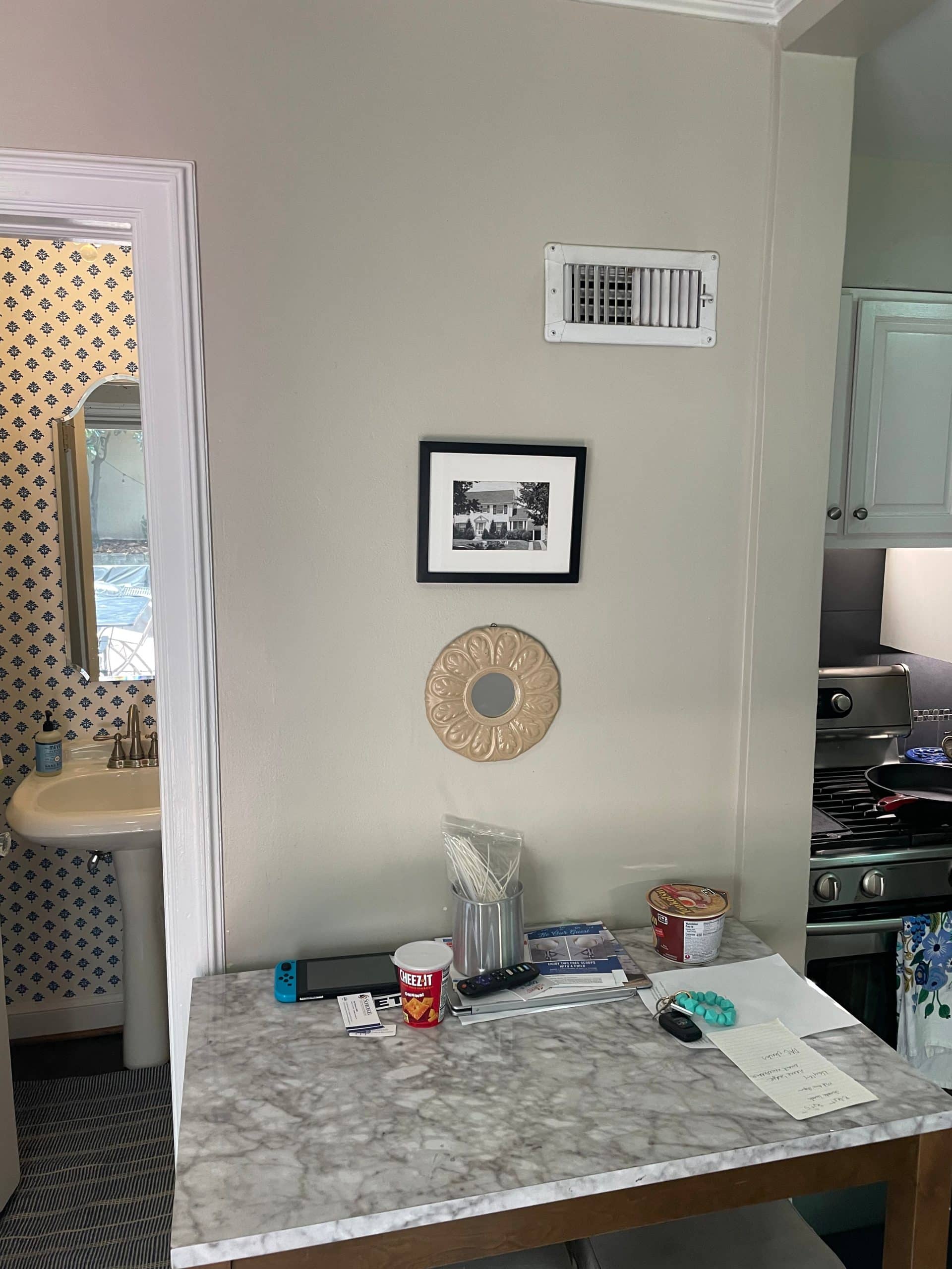 dated wall between kitchen and powder bath dated wall between kitchen and powder bath