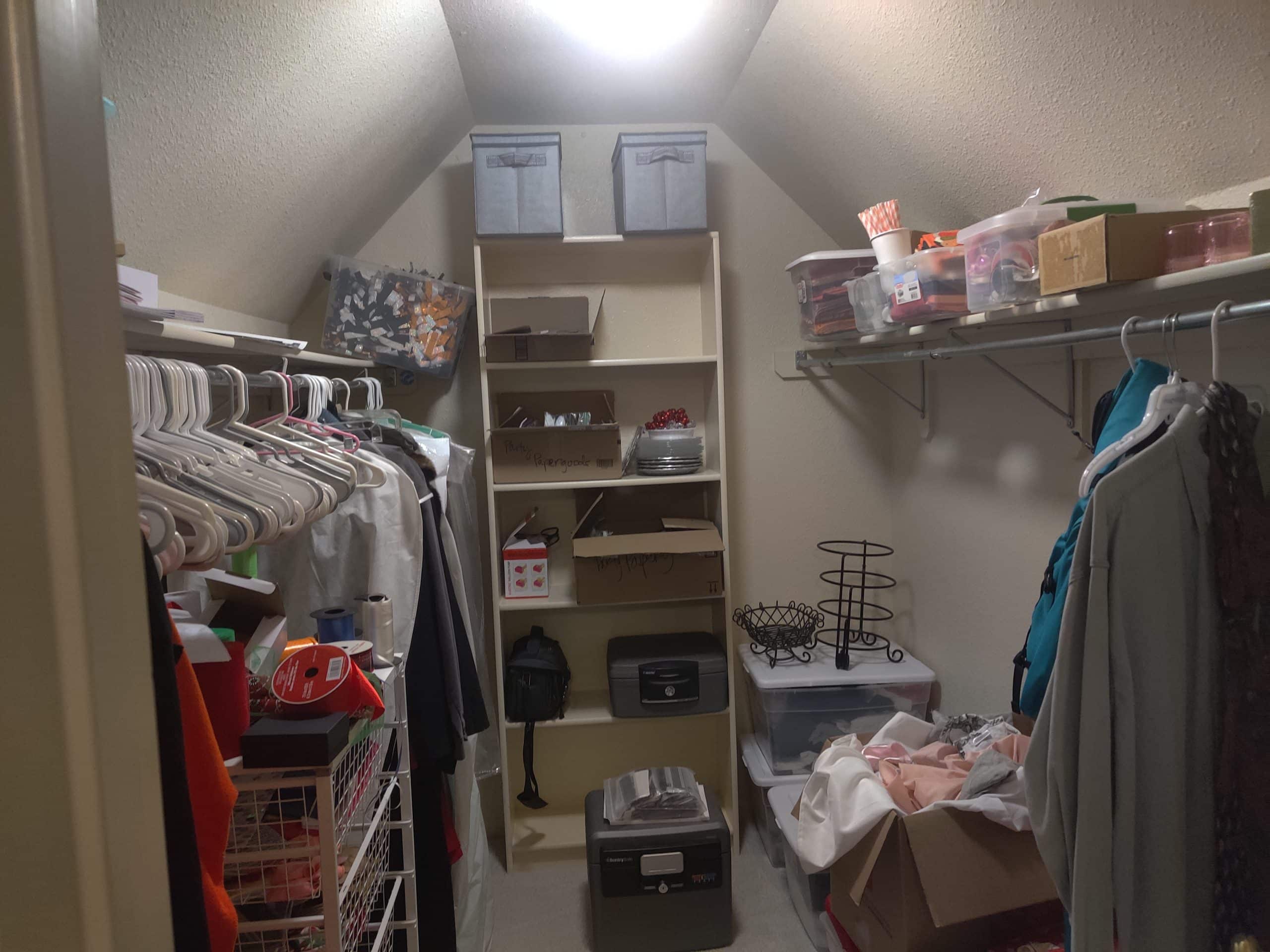 dated cramped closet wing in a primary closet before the lenexa home remodel