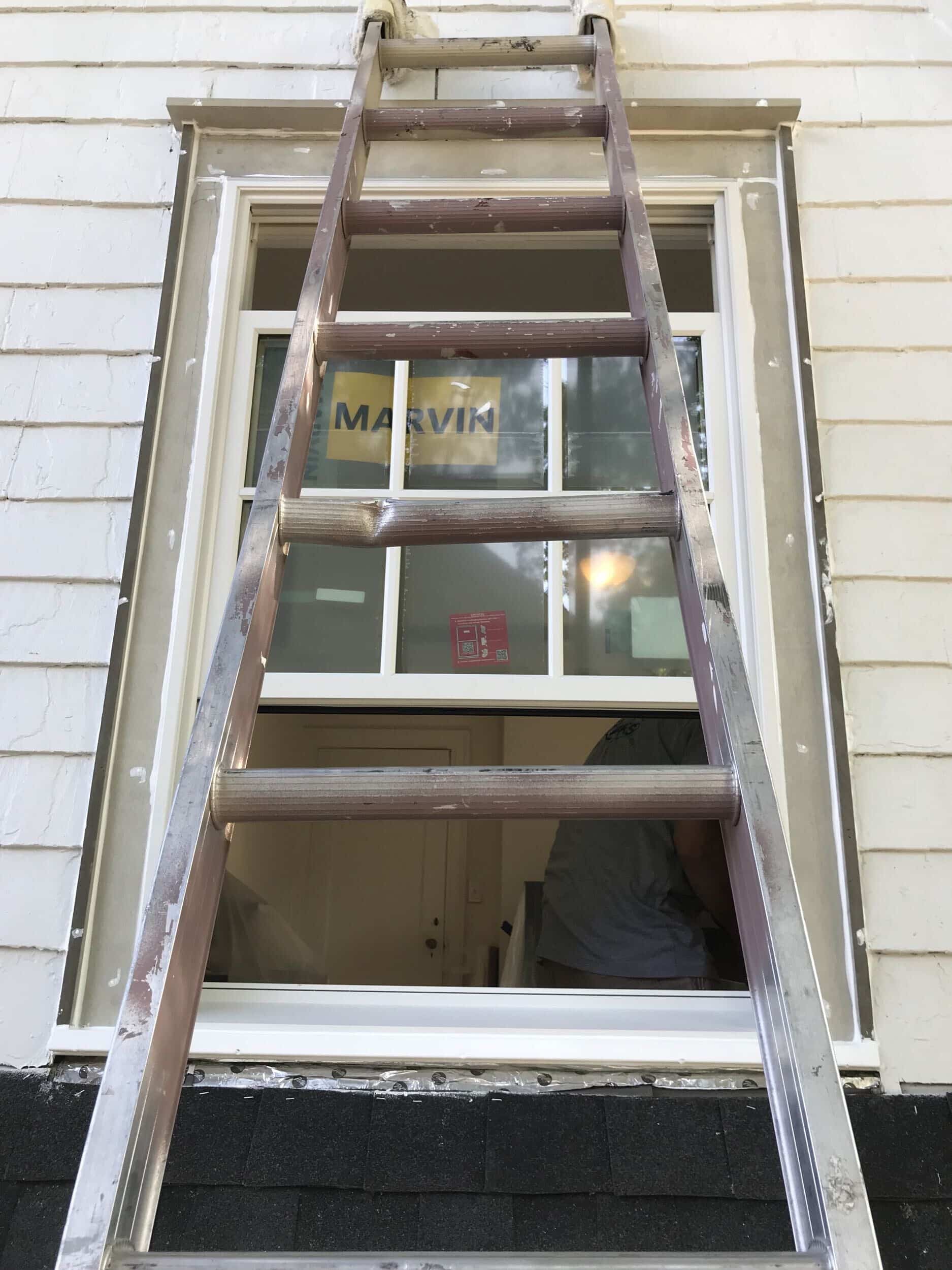 ladder outside window ladder outside window as trim is being replaced