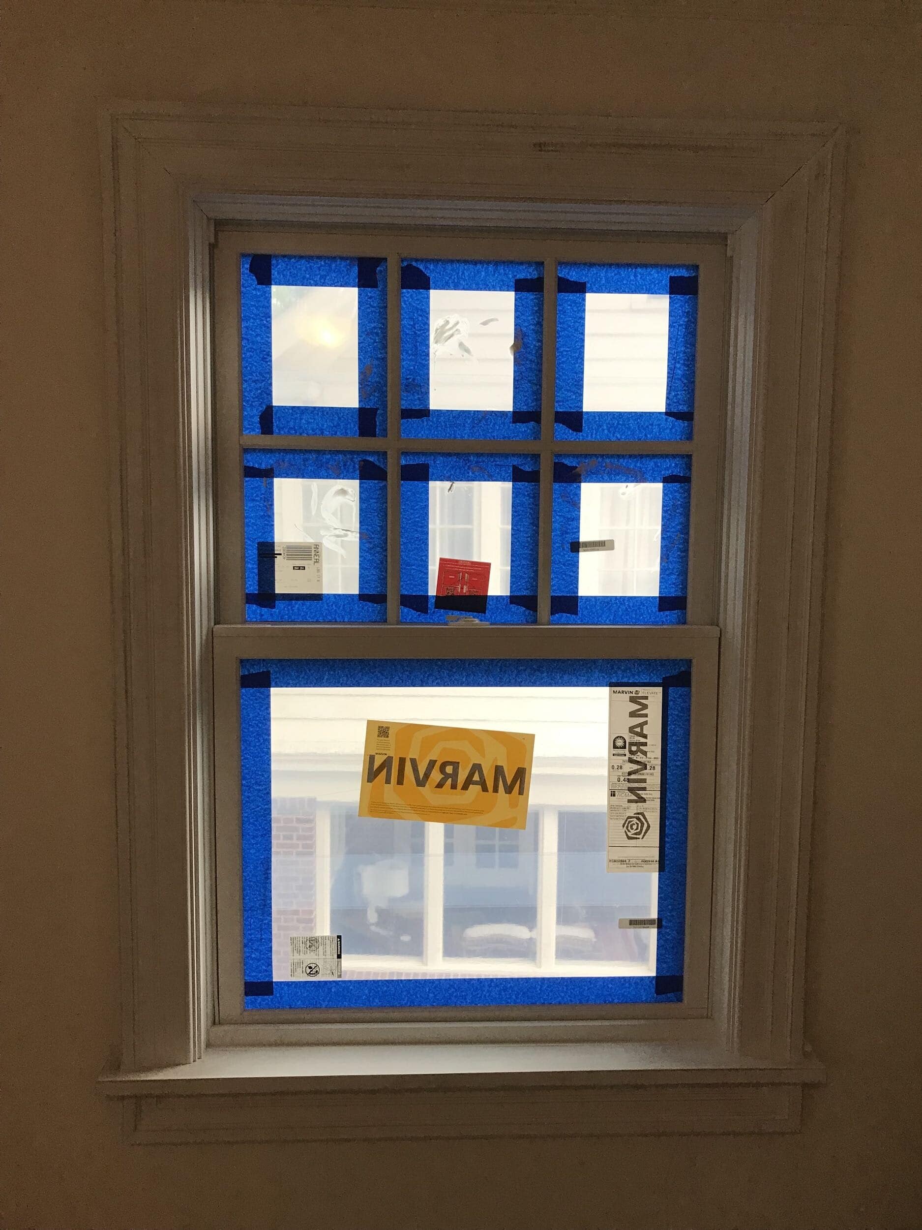 paint prep with tape on window paint prep with tape on window