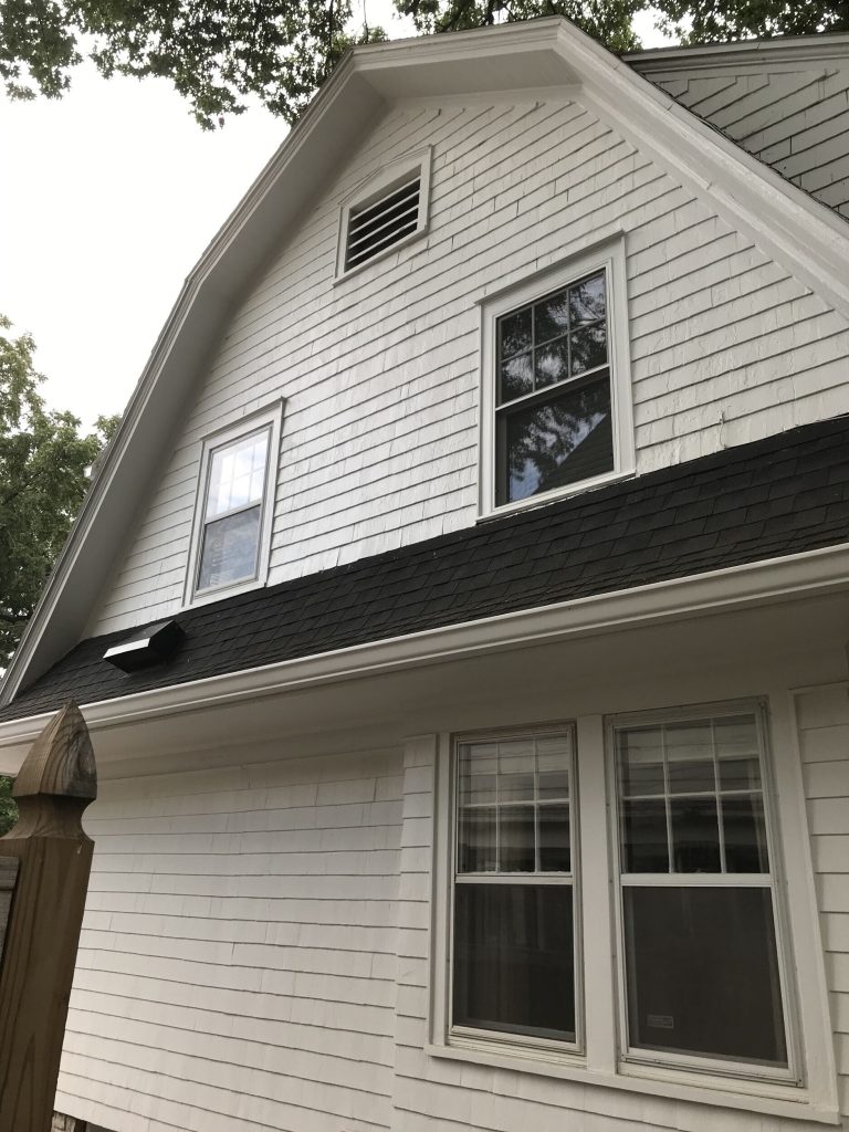 exterior view of replaced windows on home