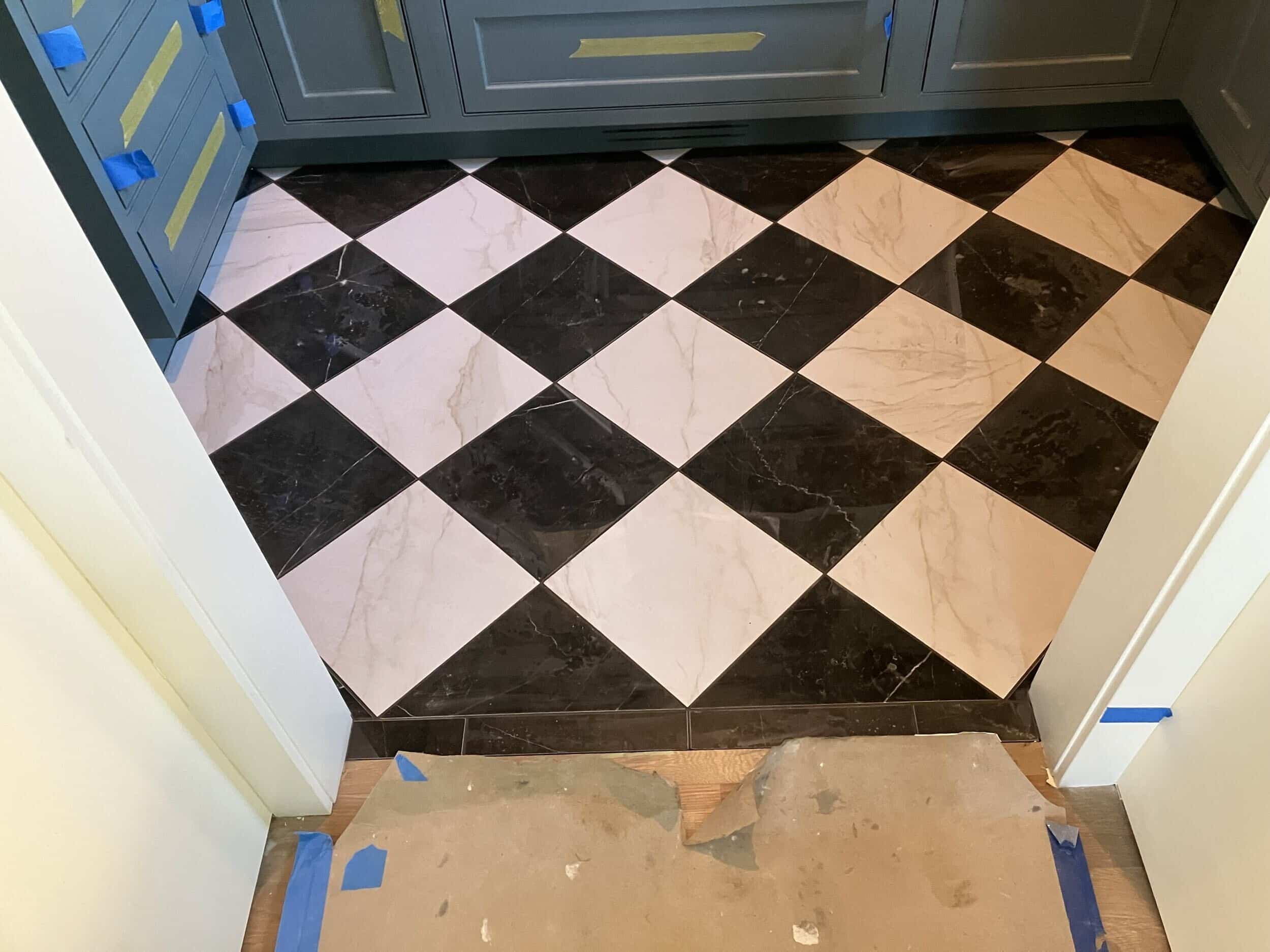 checkered floor tile in butlers pantry installed for a chic classic look