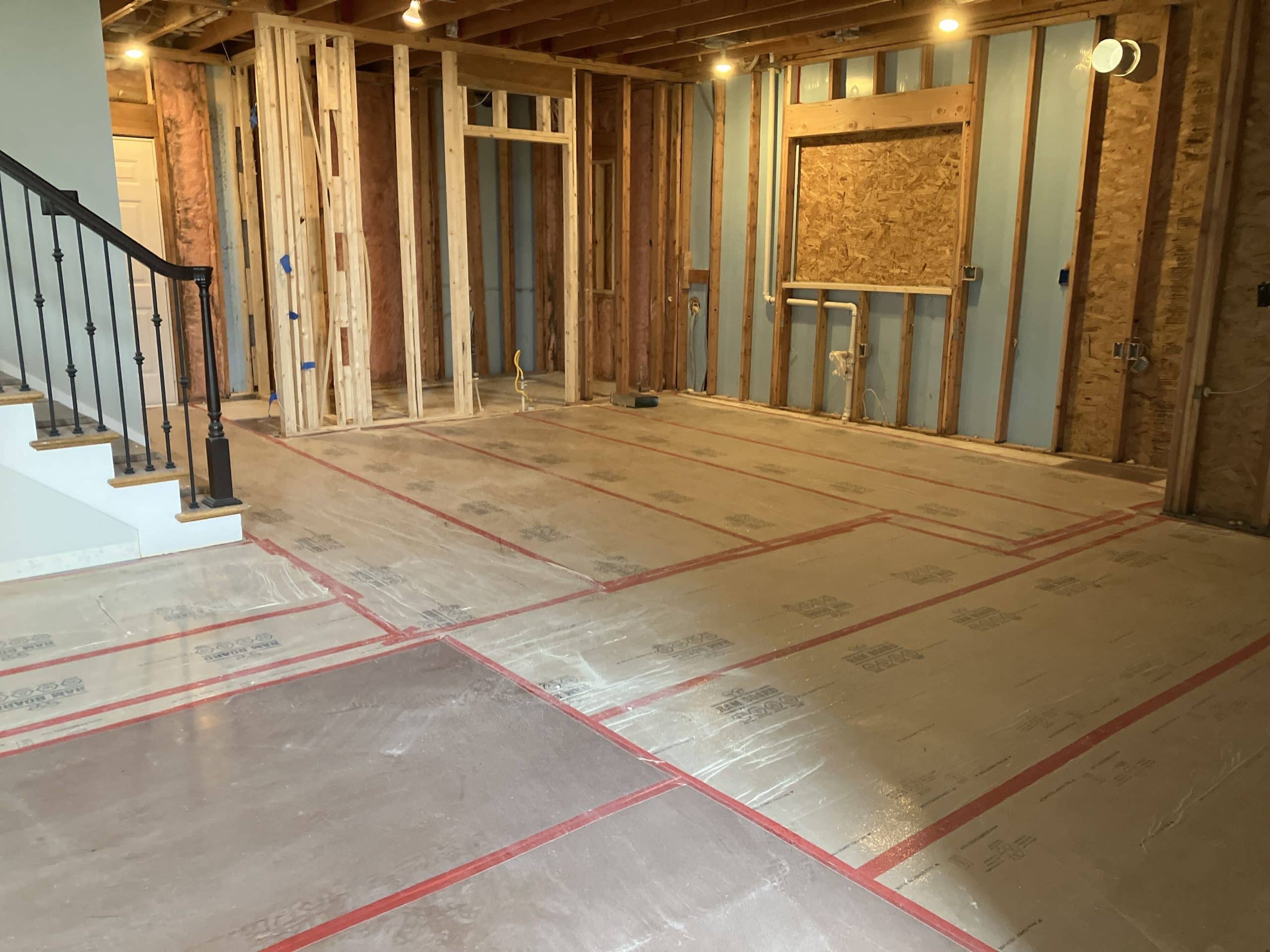 kitchen are demolition showing the insulation between framing and new framing of the butlers pantry area
