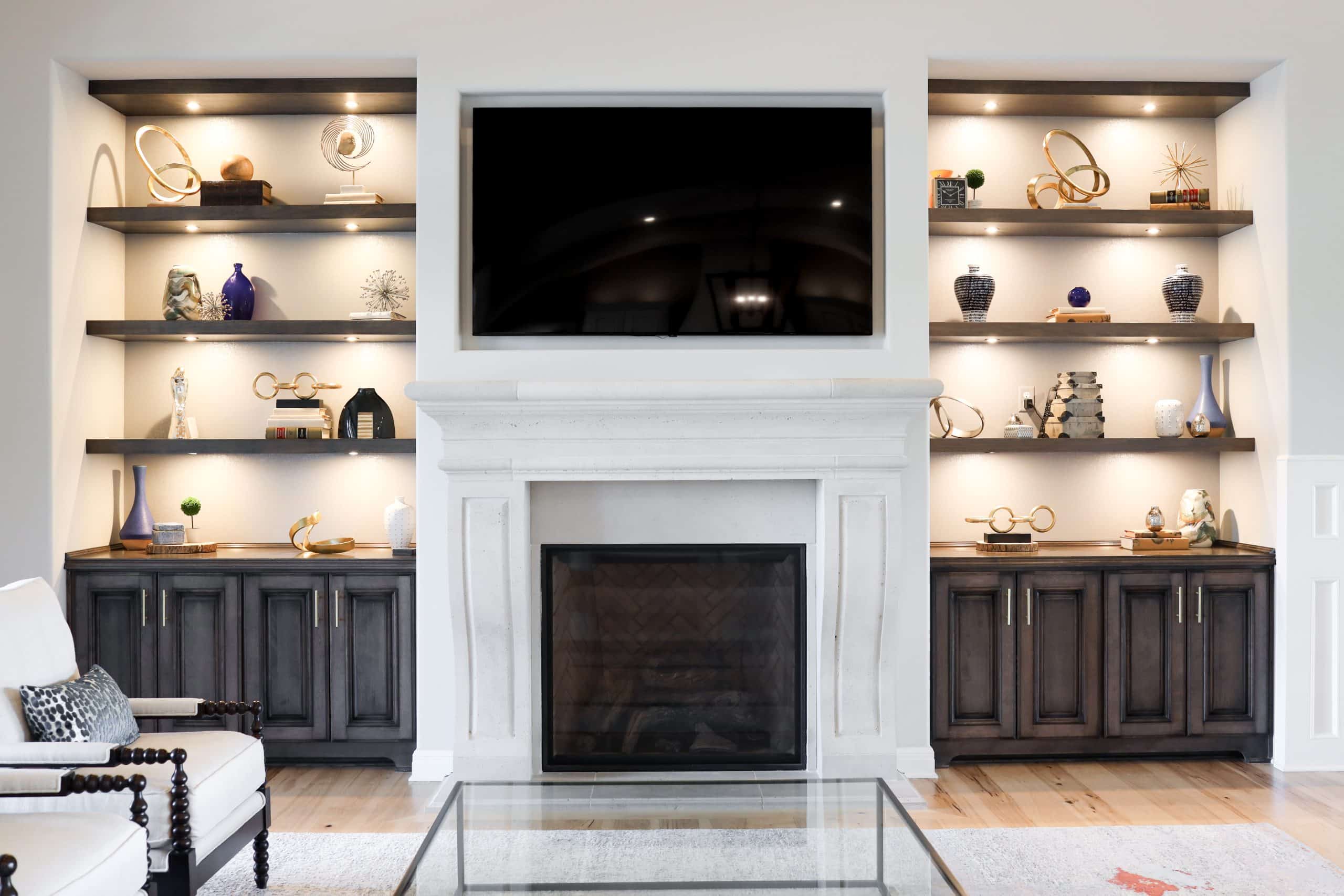 Custom shelves flanking fireplace Custom shelves flanking fireplace