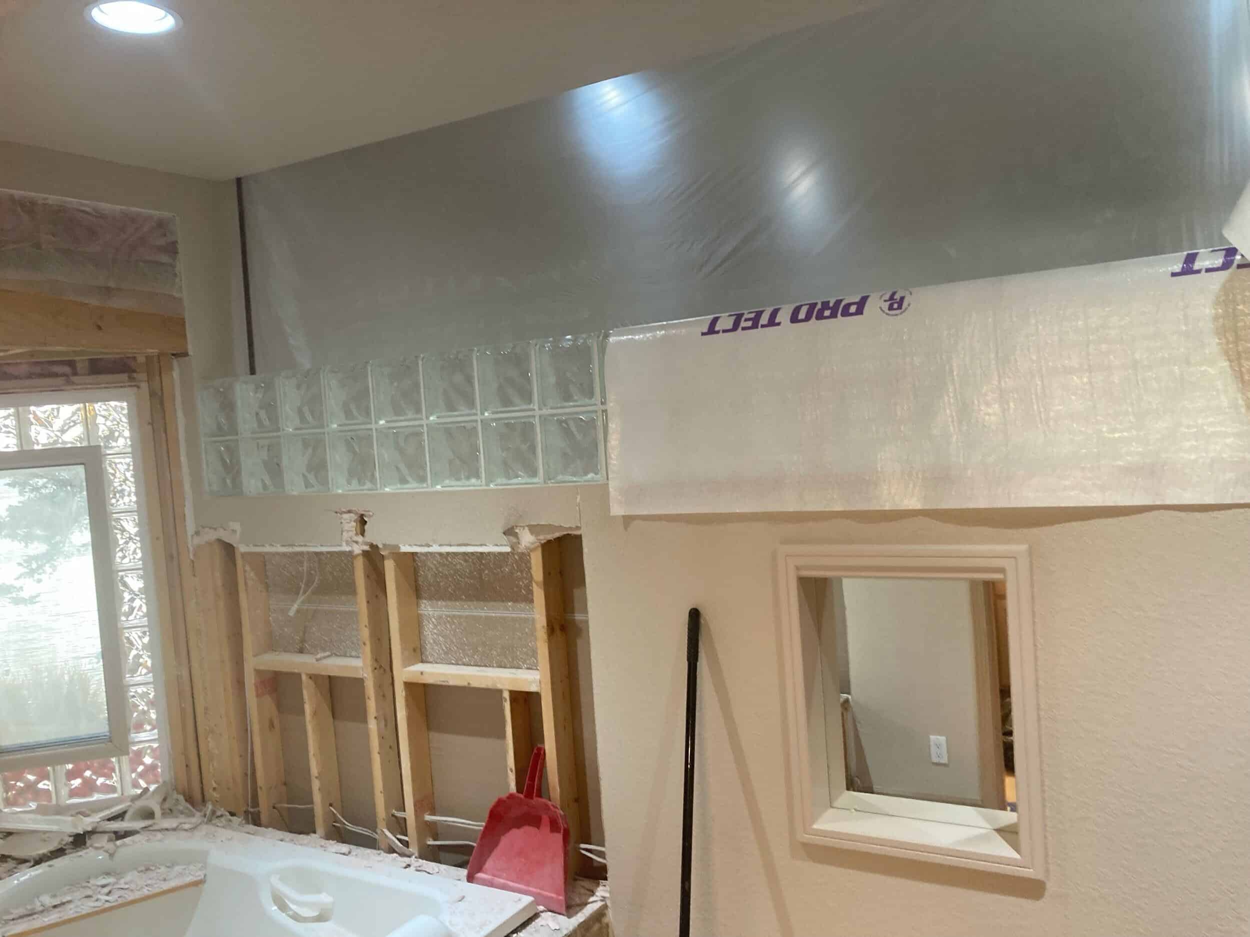 demo phase of a remodeling project for a primary bathroom at lake of the ozarks for modern living