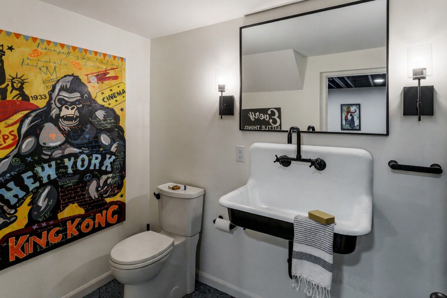 basement bathroom with retro sink and statement art basement bathroom with retro sink and statement art