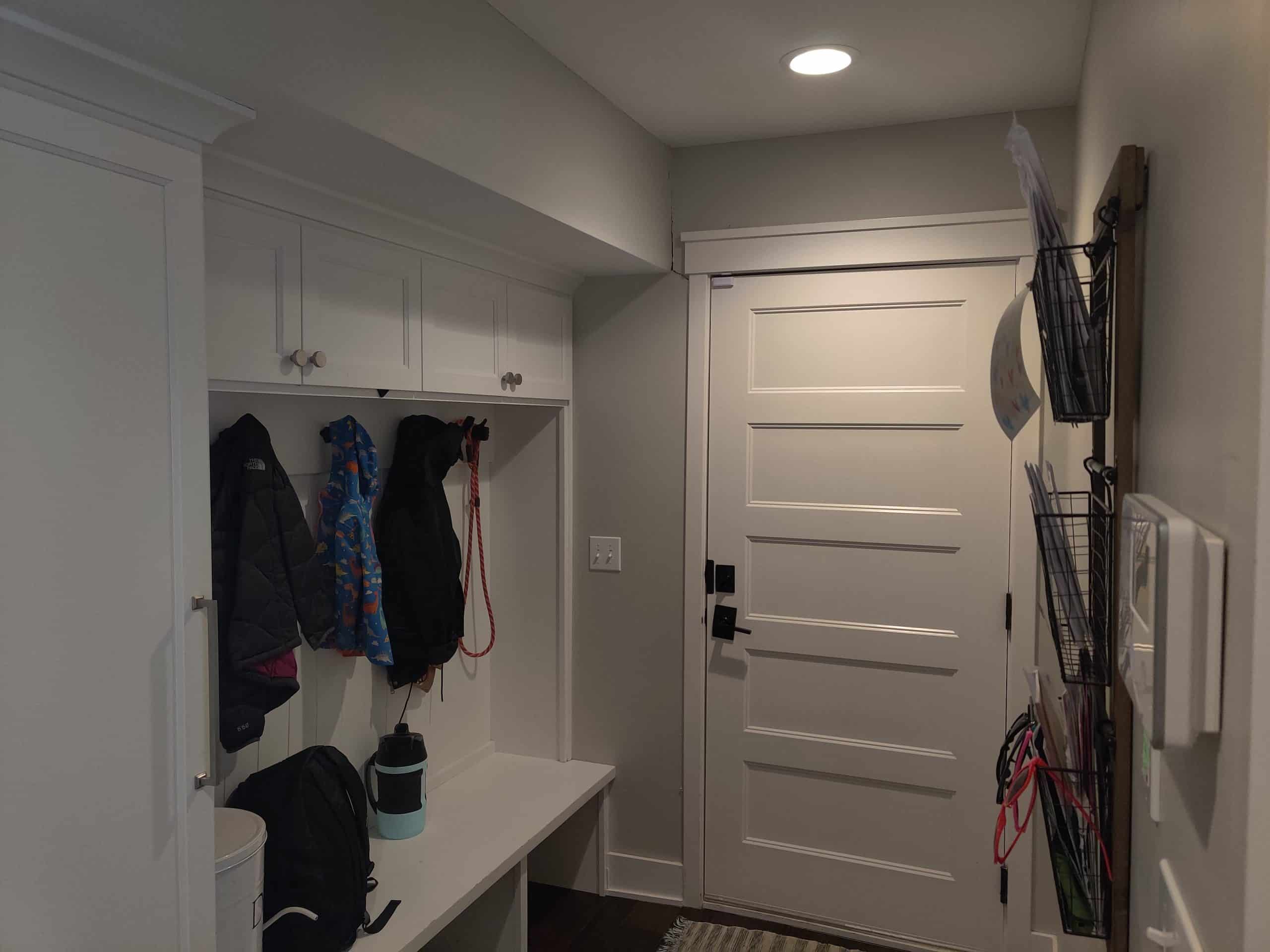 existing mudroom drop zone in Leawood before remodel and porch addition existing mudroom drop zone in Leawood before remodel and porch addition