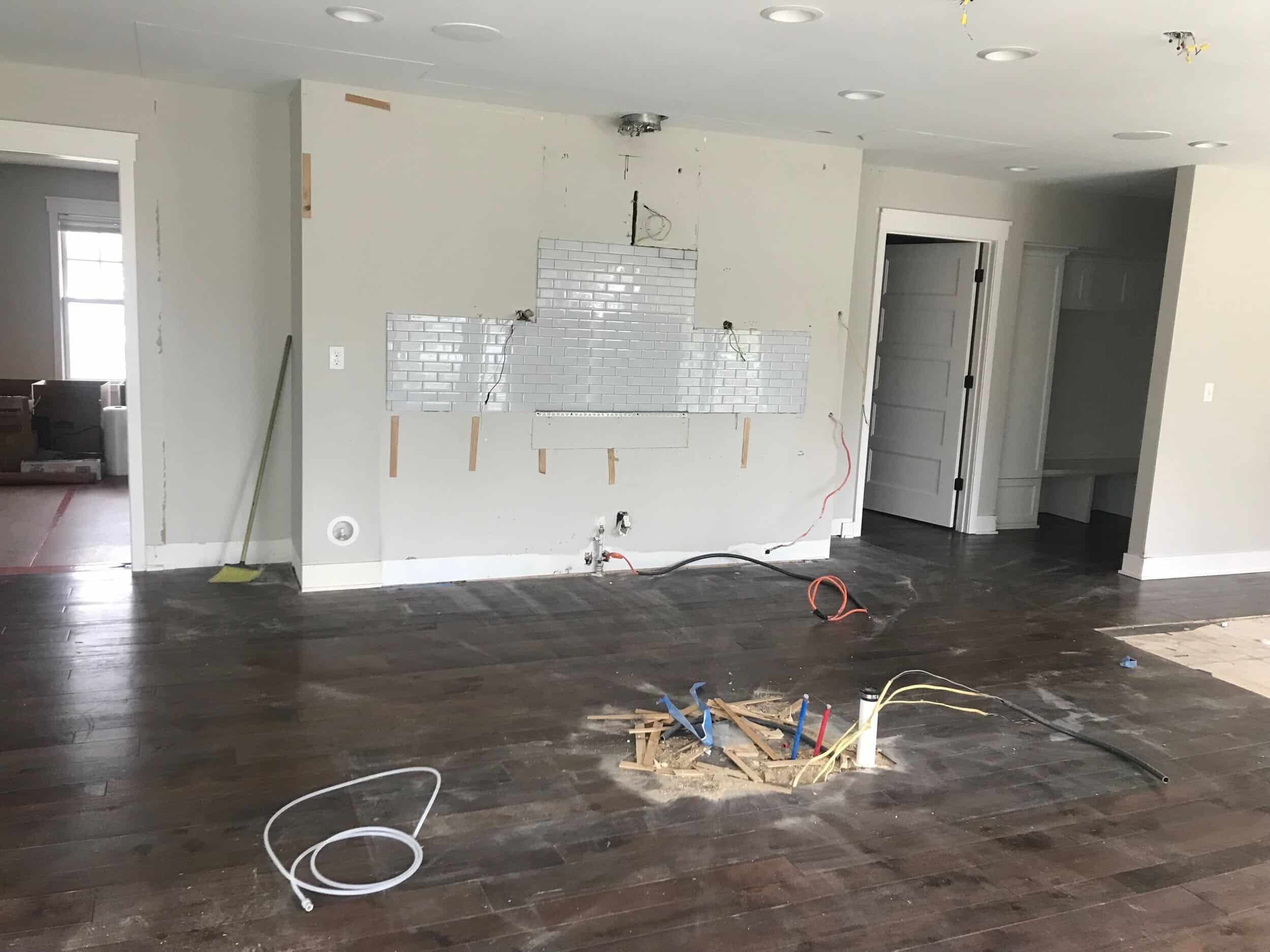 kitchen demo removed existing cabinetry to save for reinstallation