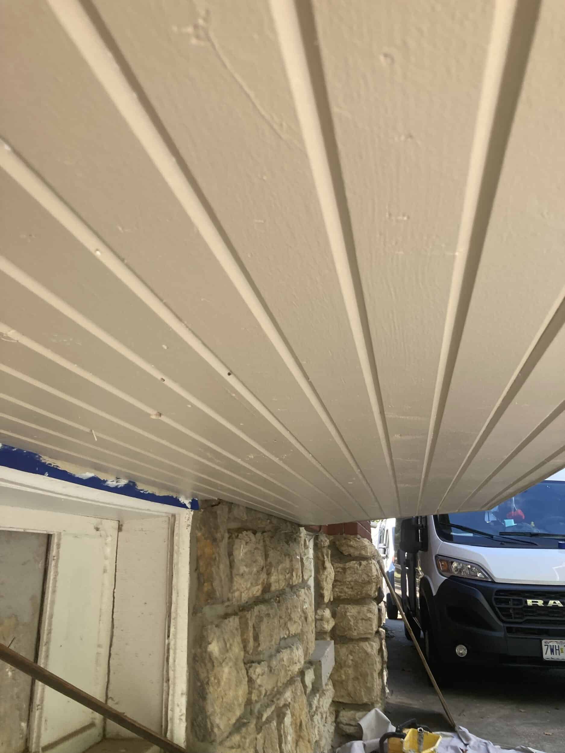painted replaced boards in wood rot repair process