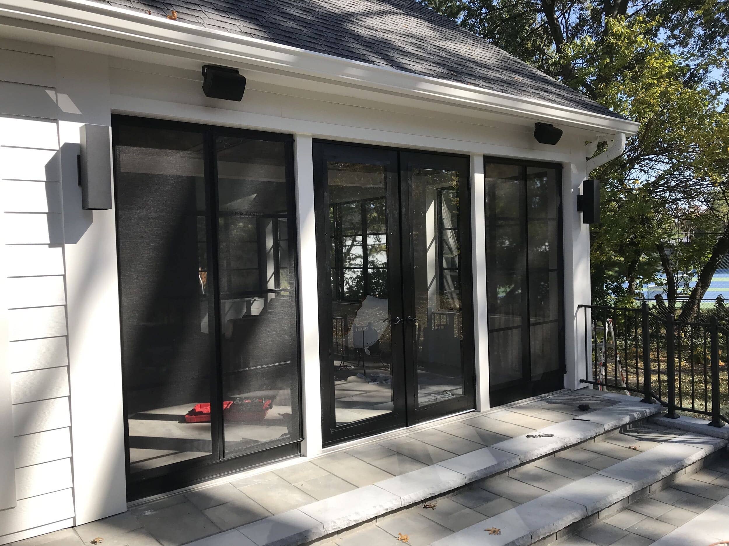 Leawood Screen porch addition project sliding door installation and handrail installation in leawood screen porch addition