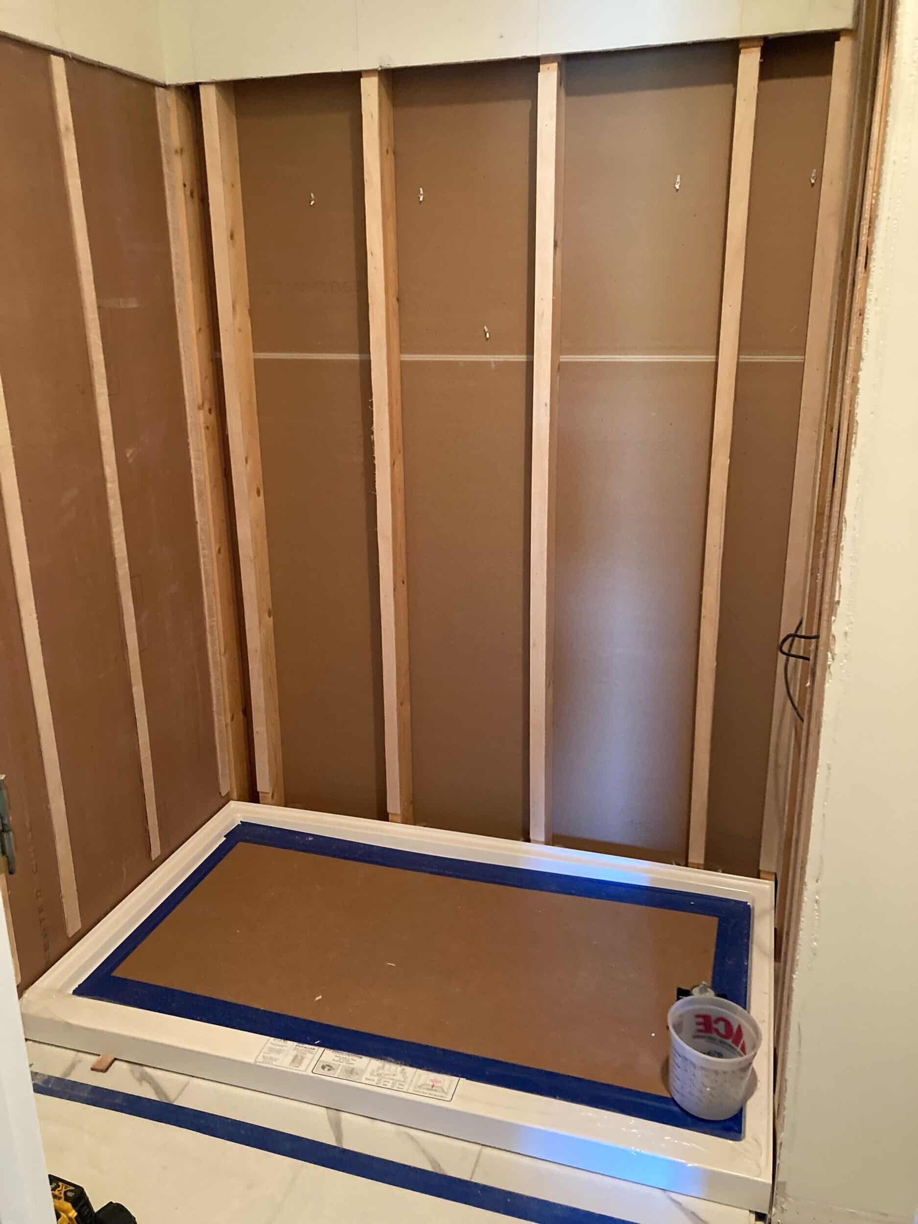 new shower pan in handyman refresh