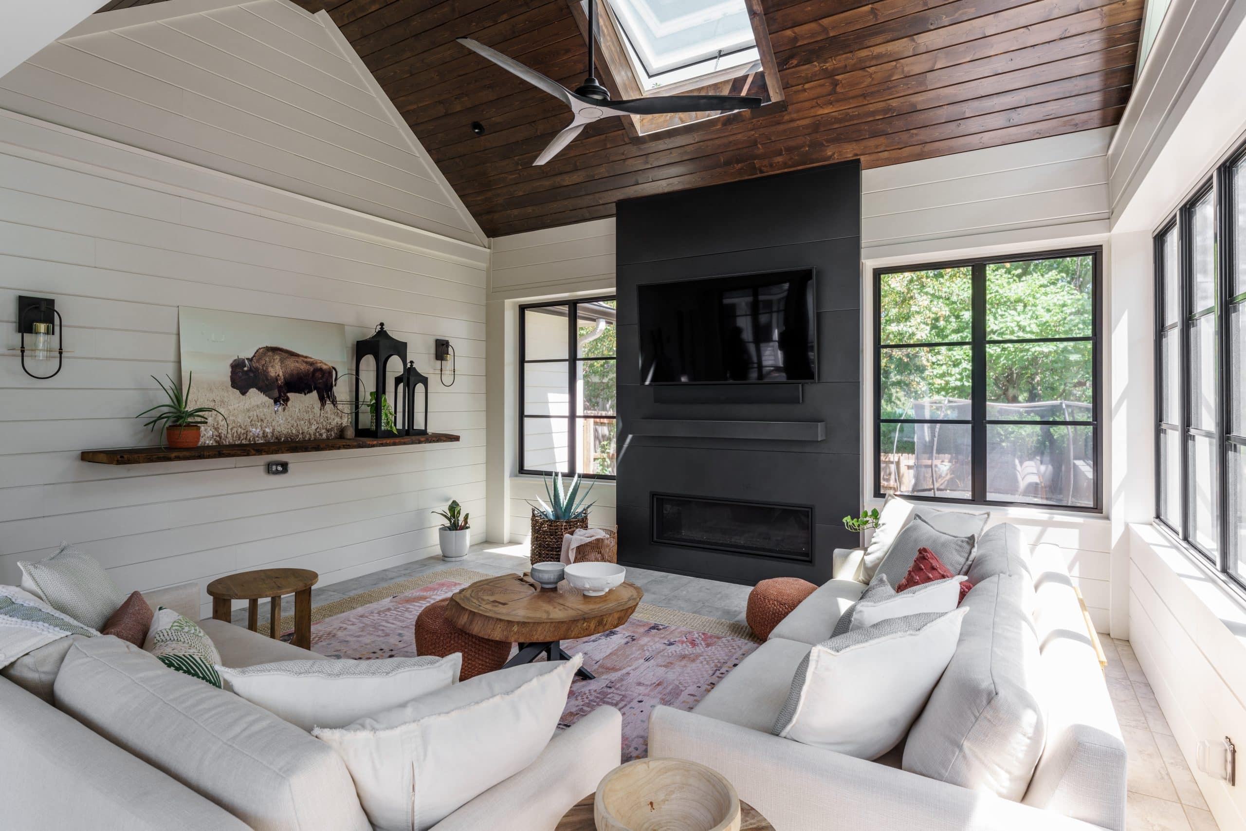 screened porch 3 seasons room remodel in Leawood screened porch 3 seasons room remodel in Leawood with stained oak ceiling slated on vaulted ceiling and black framed windows