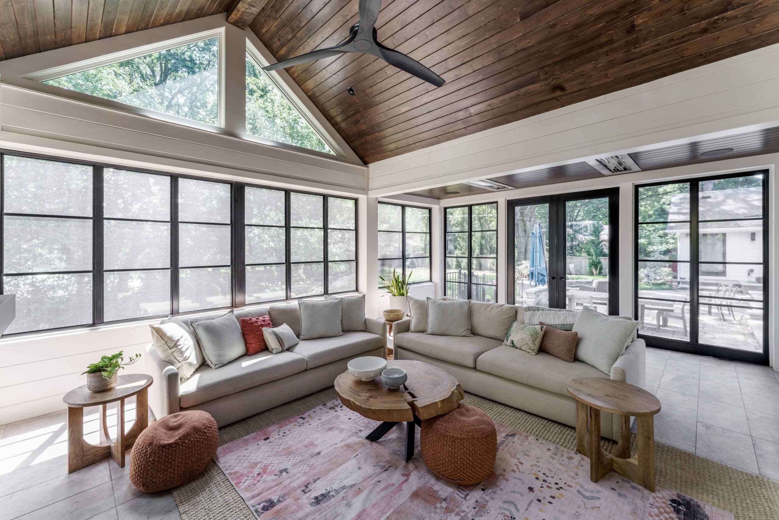 screened porch 3 seasons room remodel in Leawood with stained oak ceiling slated on vaulted ceiling and black framed windows screened porch 3 seasons room remodel in Leawood with stained oak ceiling slated on vaulted ceiling and black framed windows