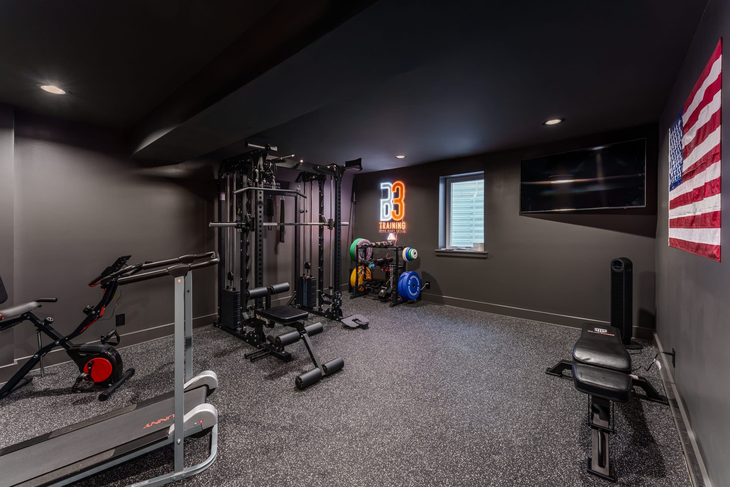 moody modern basement gym moody modern basement gym with charcoal color drenched walls and ceiling and dark floors too