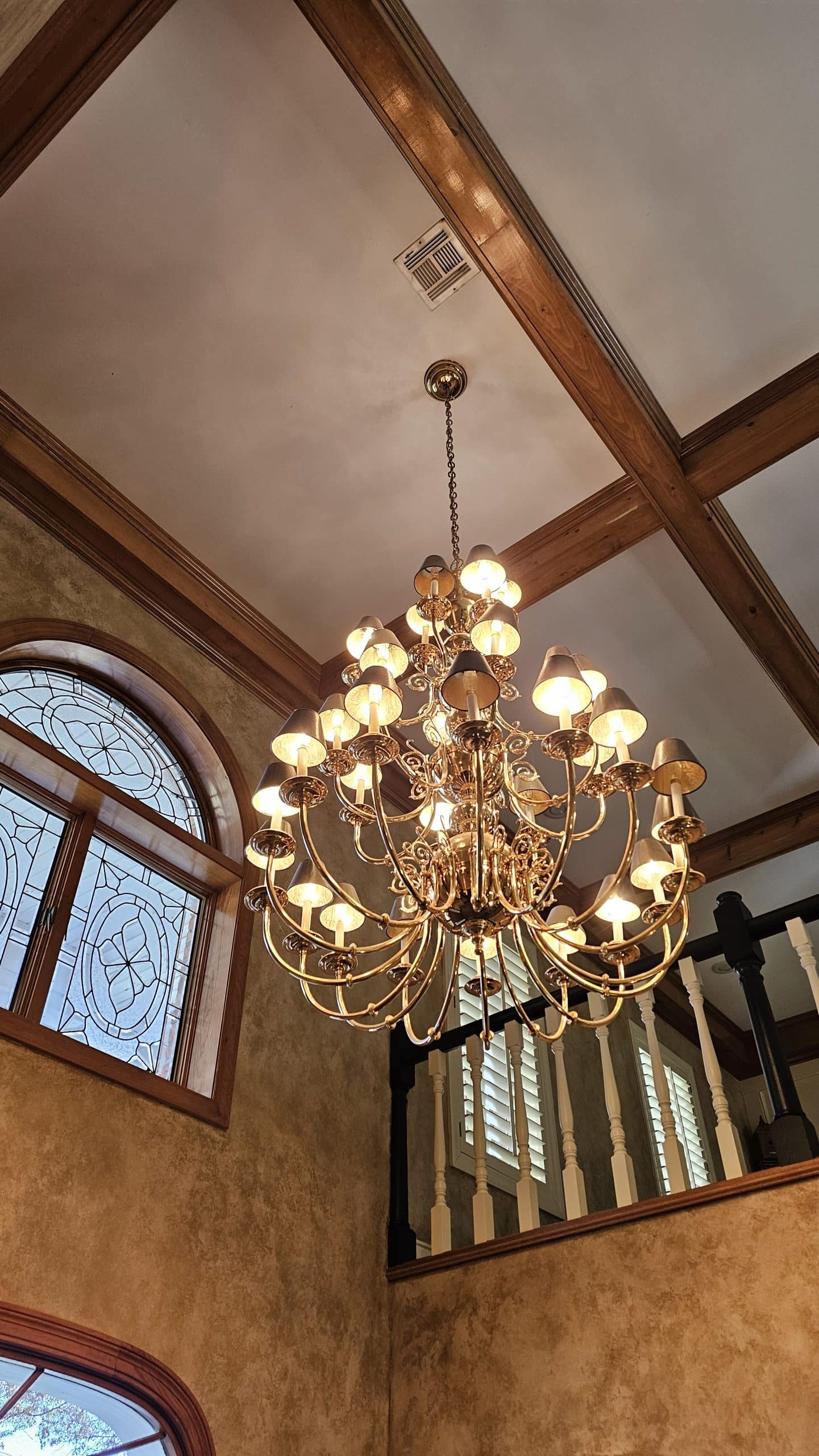 dated entry fixture before handyman remodel in Lenexa