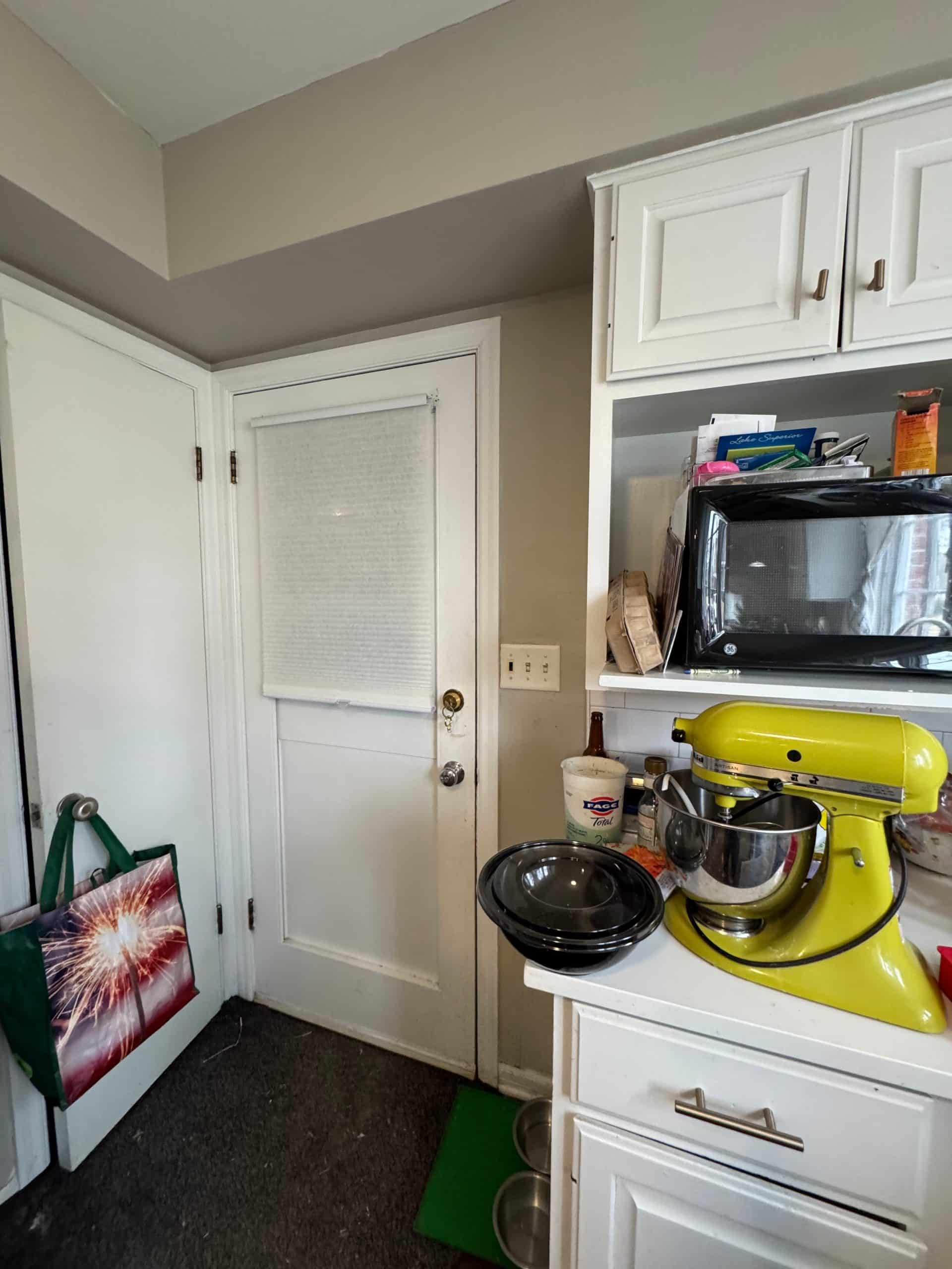 garage entry into home before remodeling in kansas city