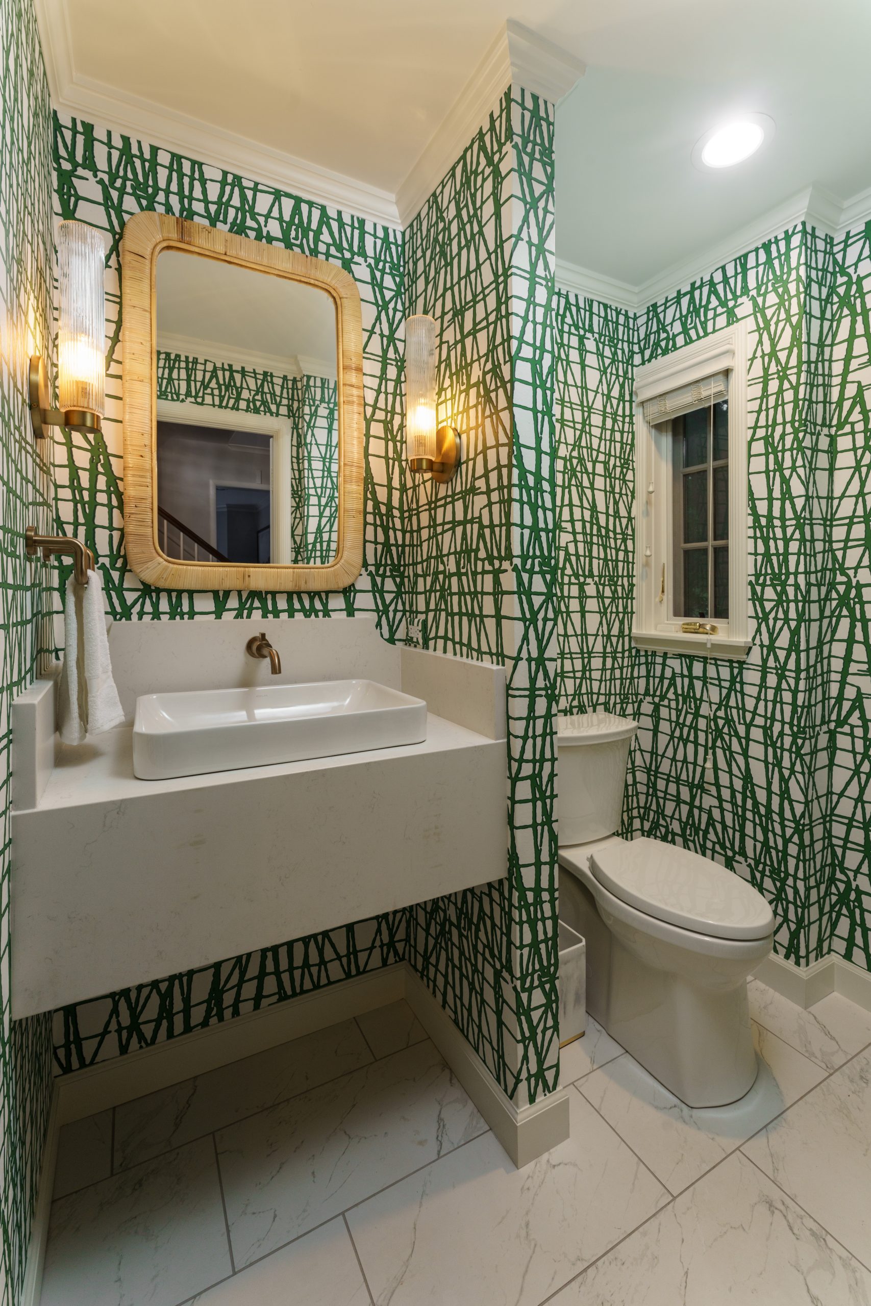bold powder bath design with green and white wallpaper 