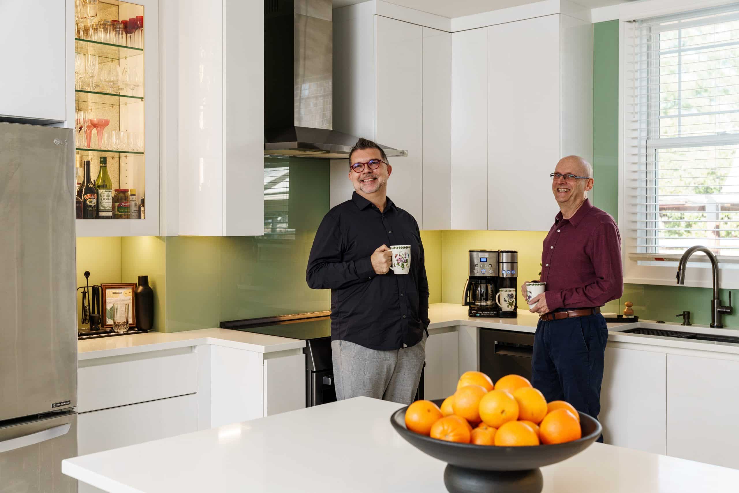couple enjoying coffee in their new kitchen