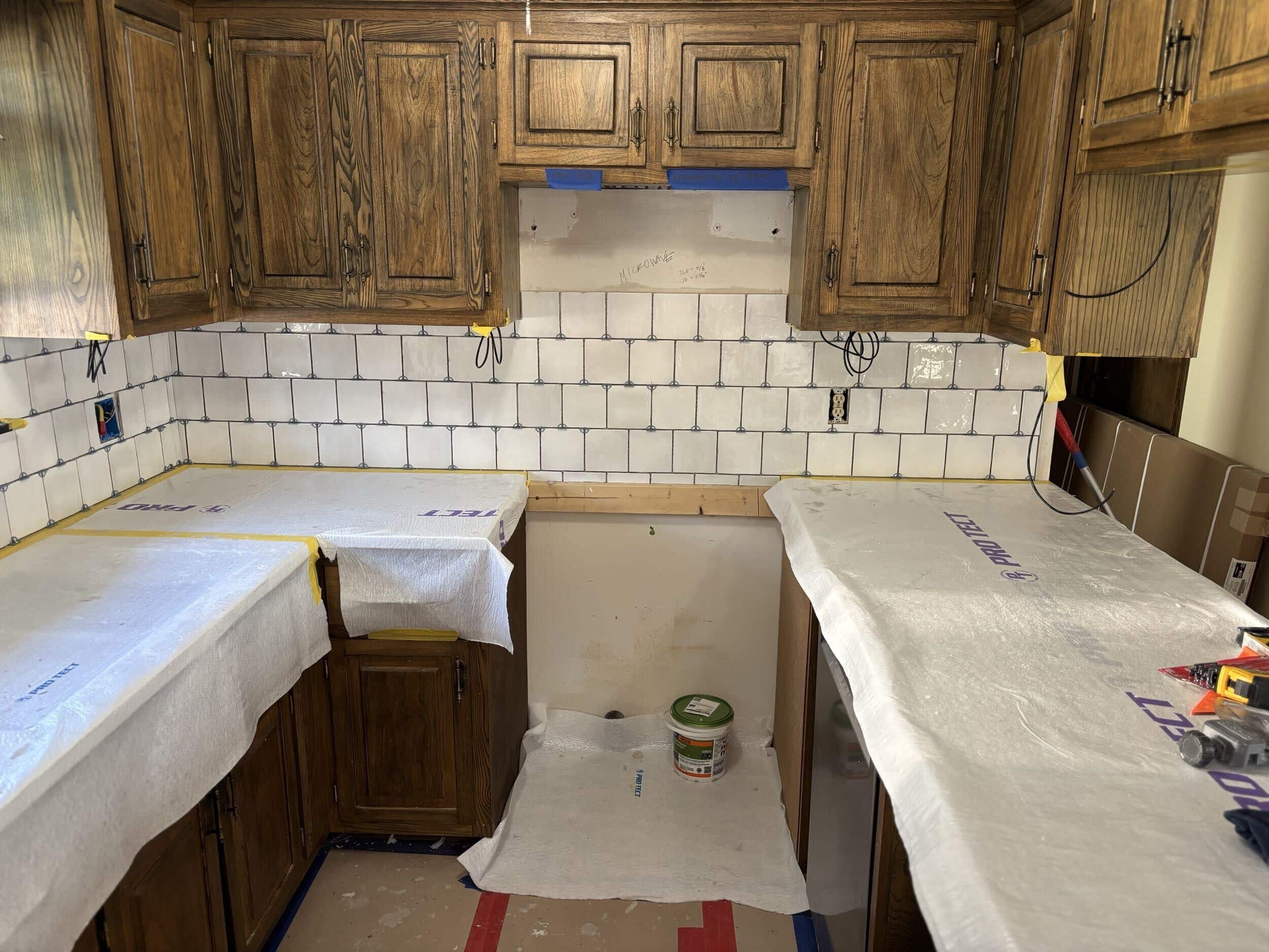Kitchen remodel with new backsplash installed at Lake of the Ozarks kitchen remodel by handyman team