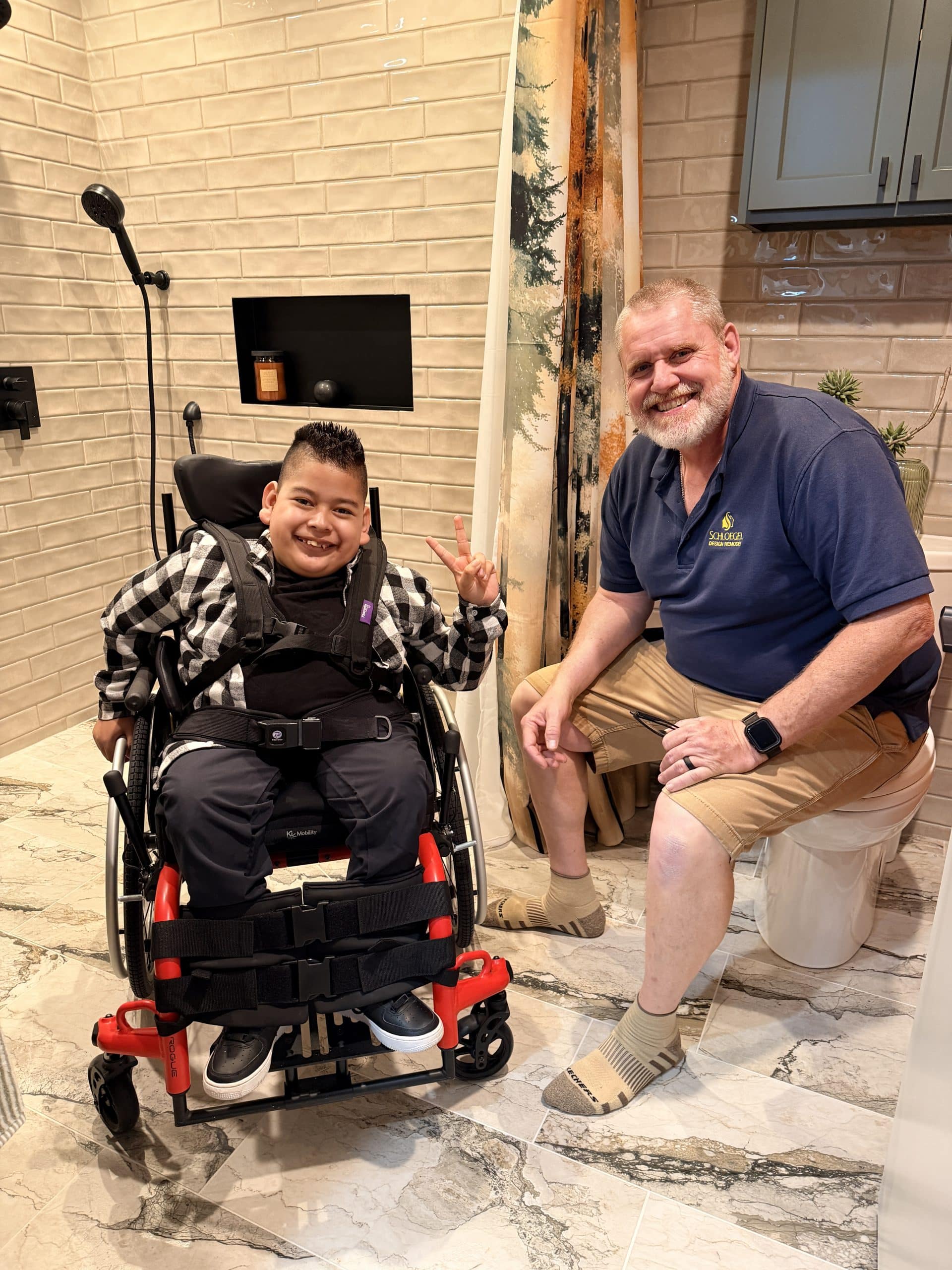 Matthew and Don at final accessible bathroom remodel reveal Matthew and Don at final accessible bathroom remodel reveal