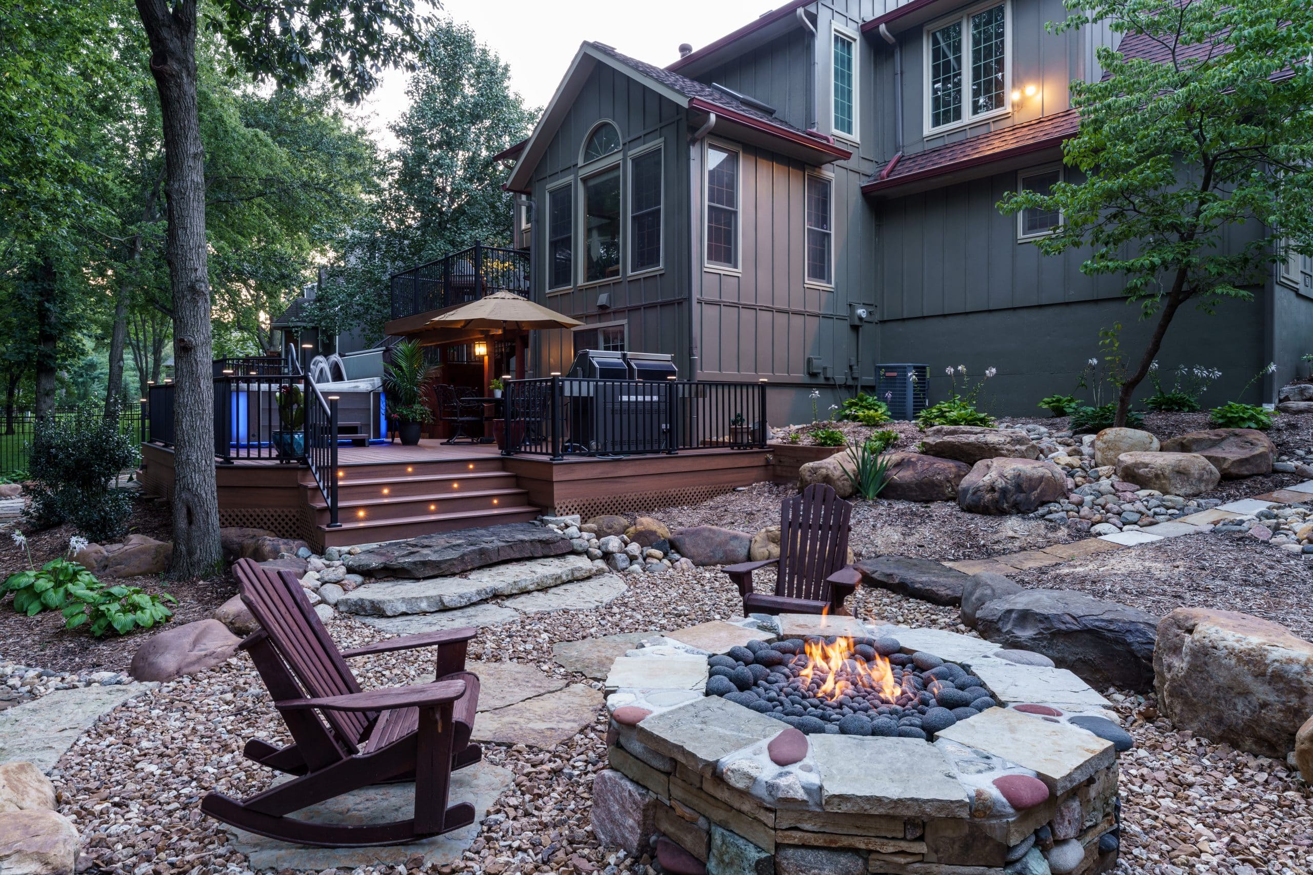Outdoor space with firepit and deck Outdoor space with firepit and deck