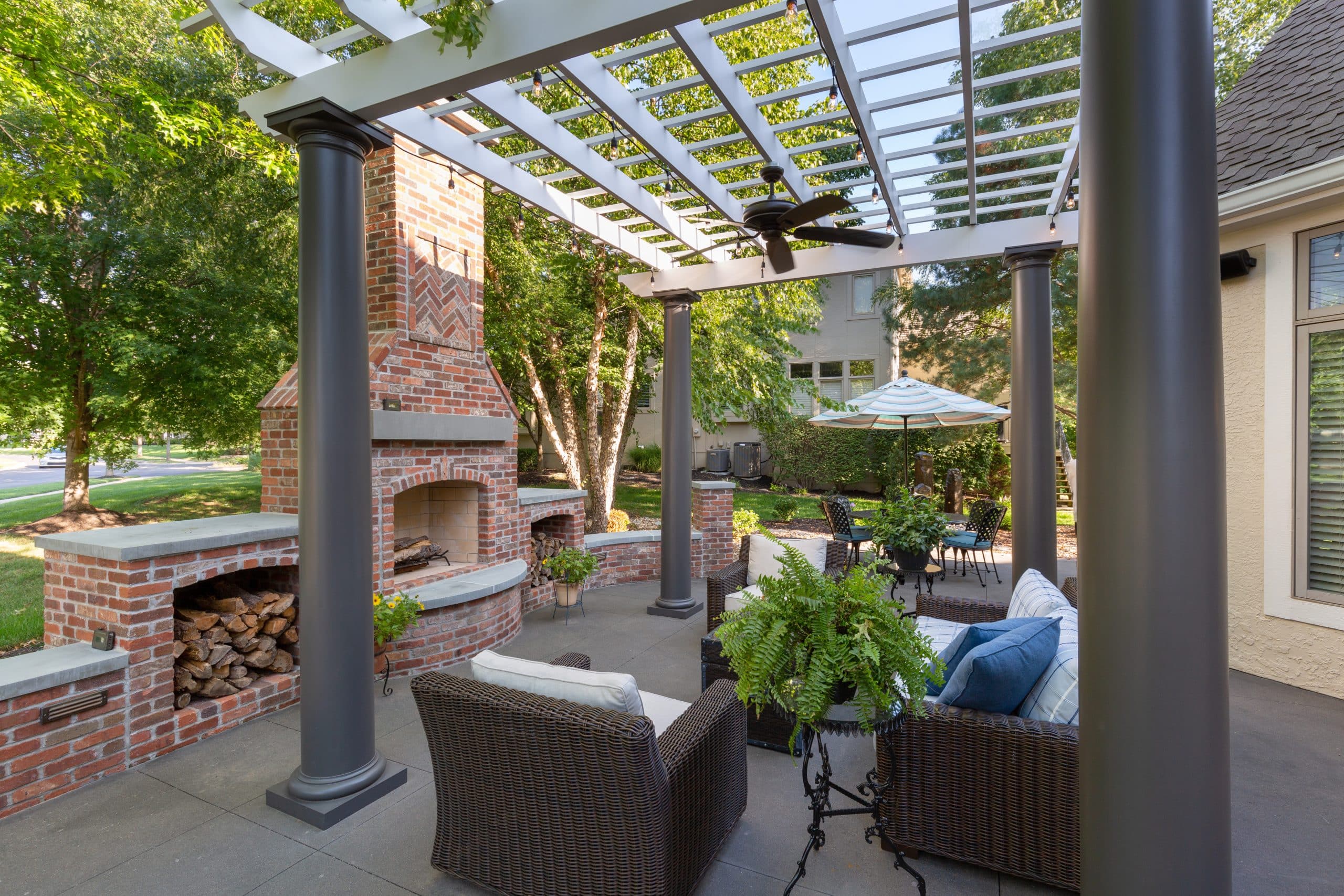 Porch with pergula & fireplace Porch with pergula & fireplace