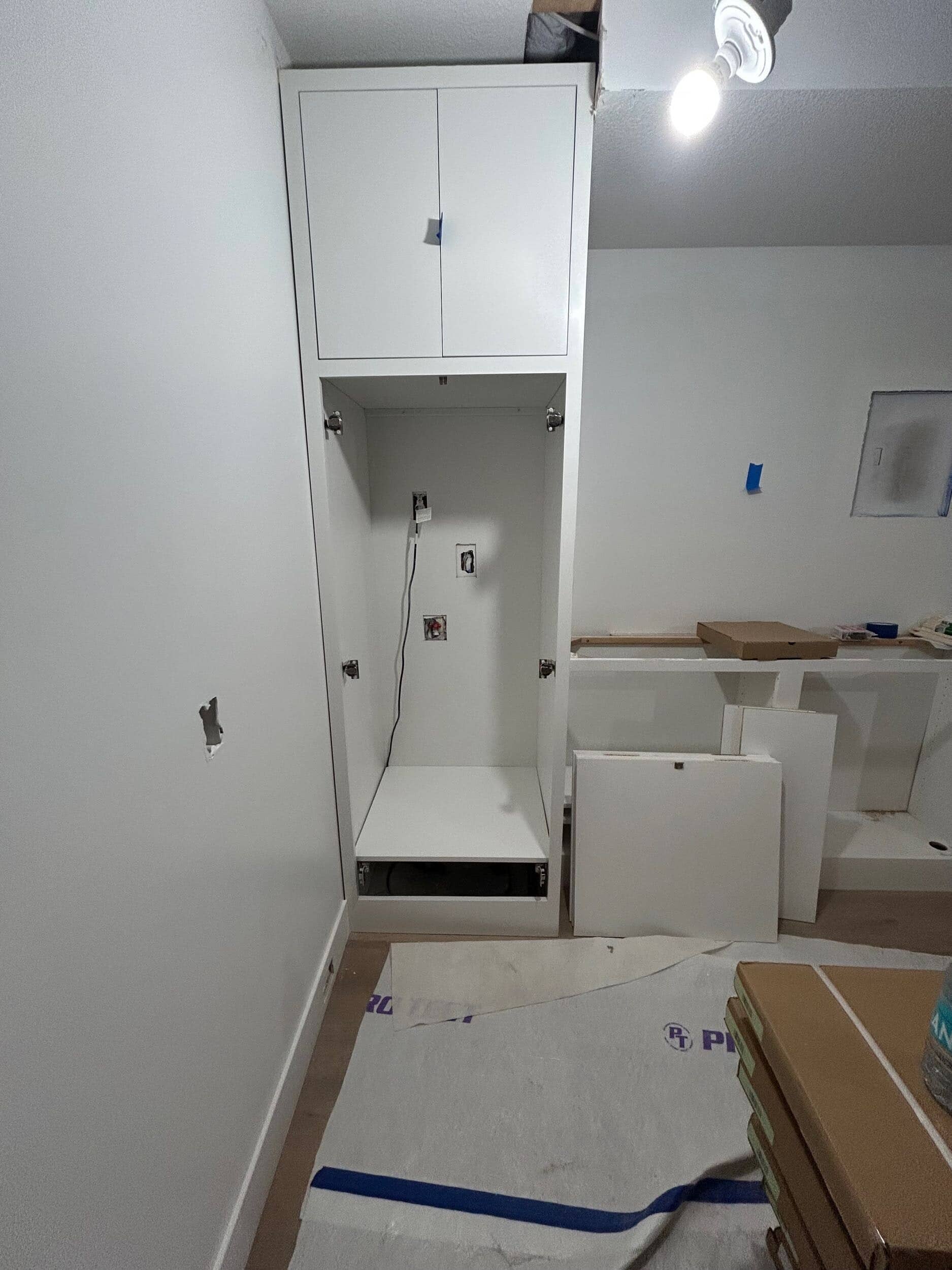 custom cabinetry installed in custom fitness studio home gym remodel in Cedar Creek, Olathe