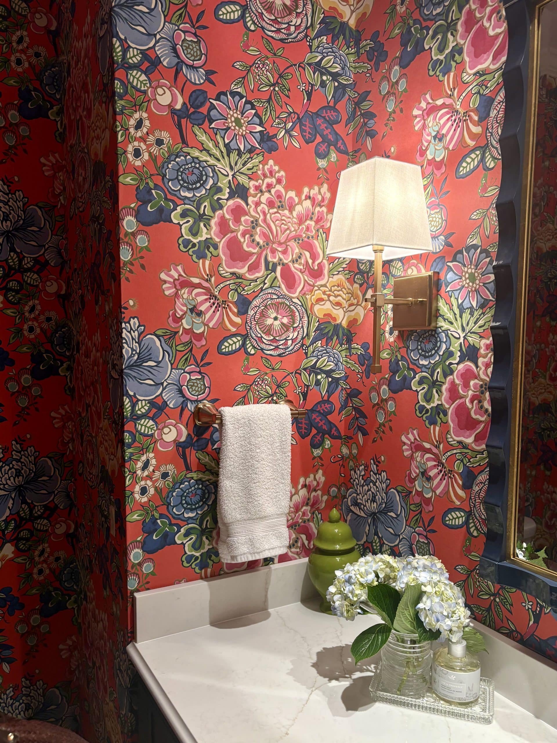 sconce detail in Prairie Village Hall Bathroom Refresh with handyman updates
