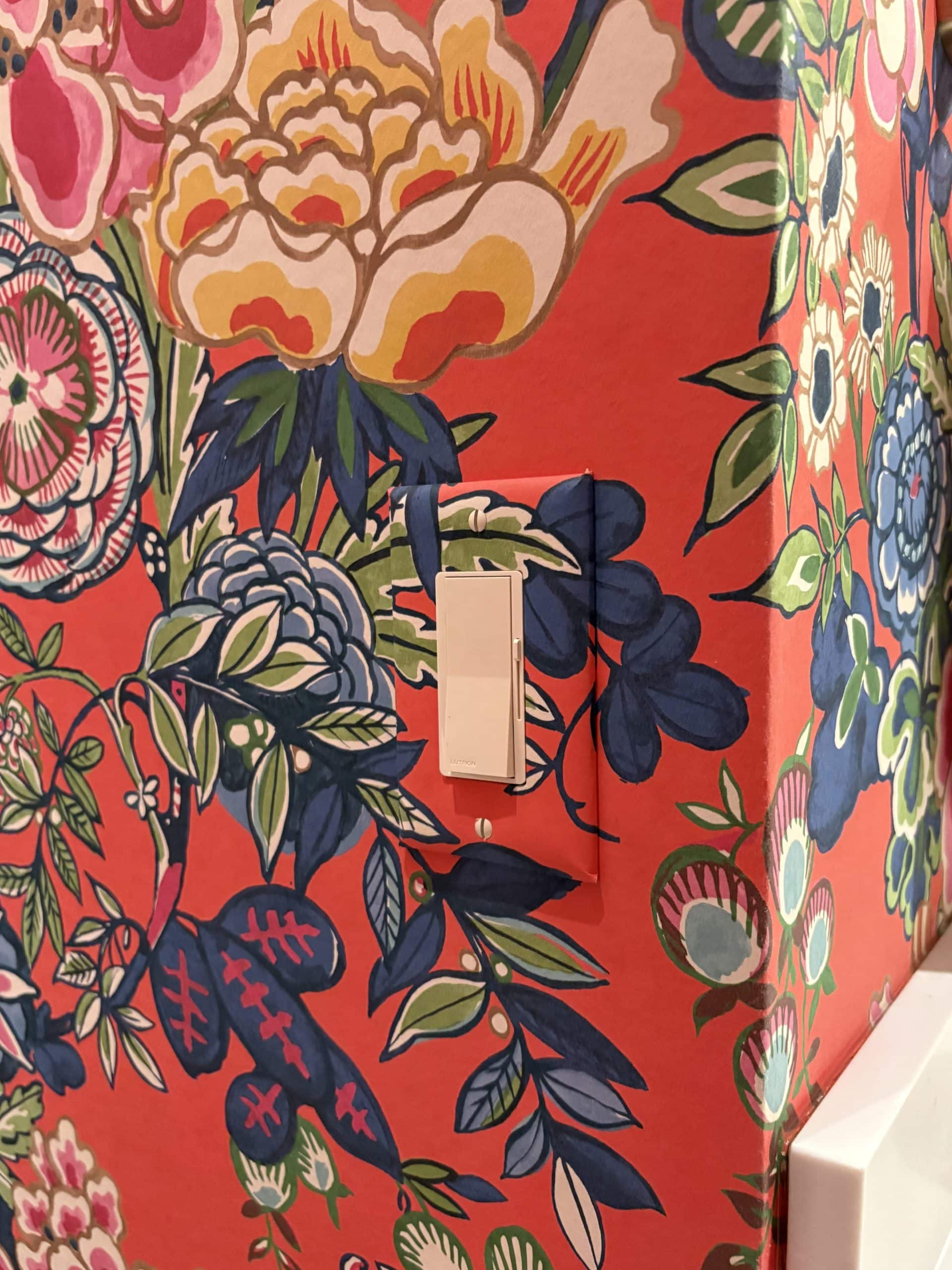 wallpaper covered light switch in Prairie Village Hall Bathroom Refresh with handyman updates