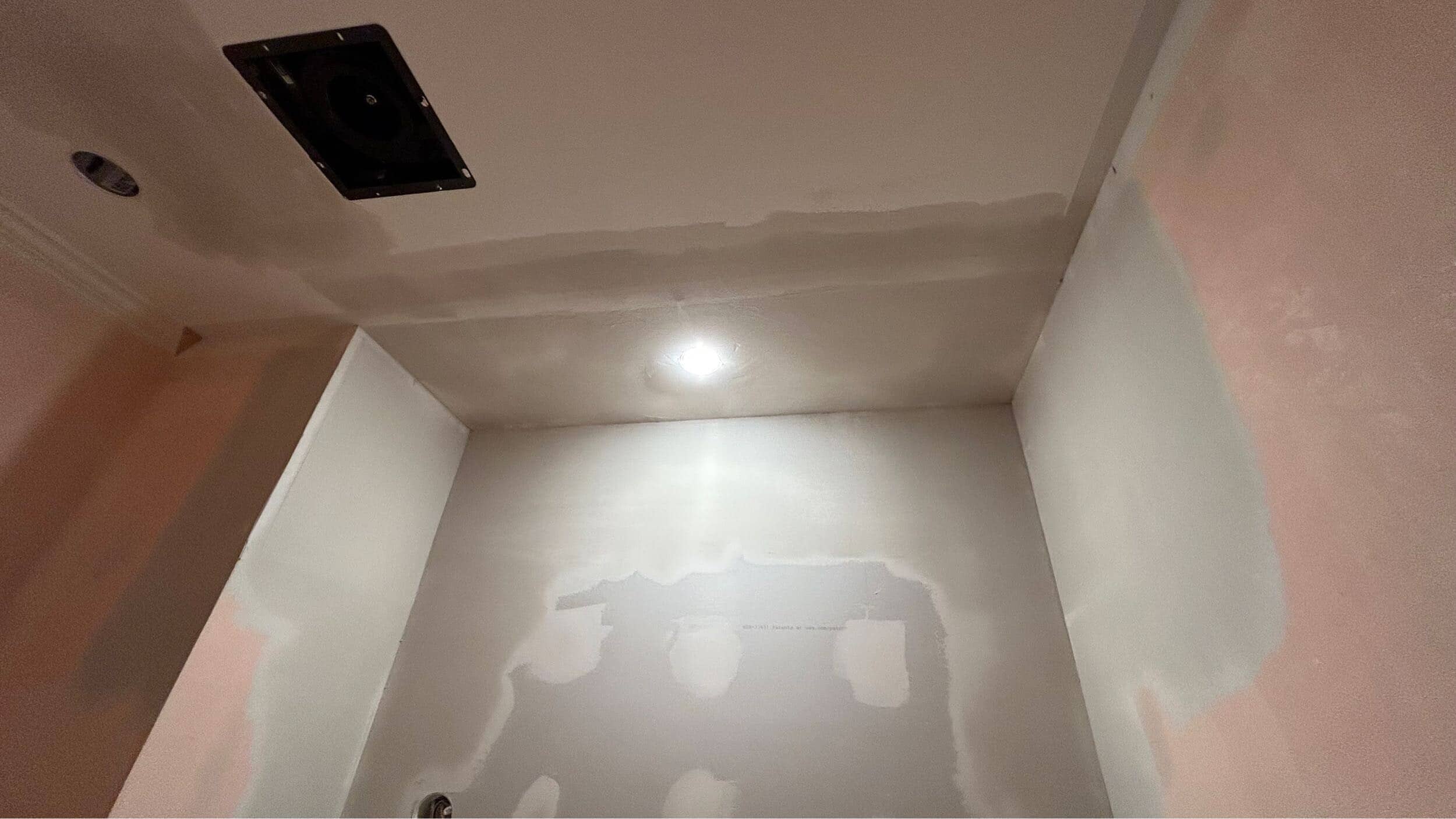 drywall patching repair in hall bathroom