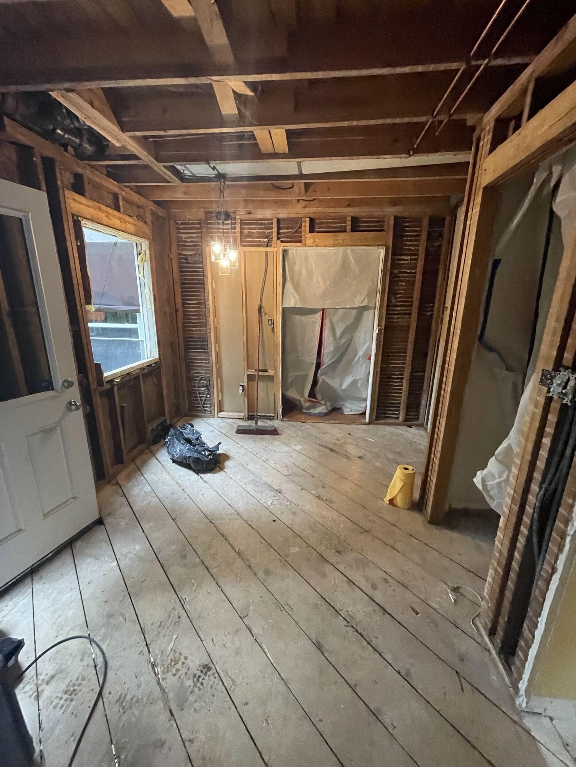 interior view of kitchen demo in Fairway home remodel