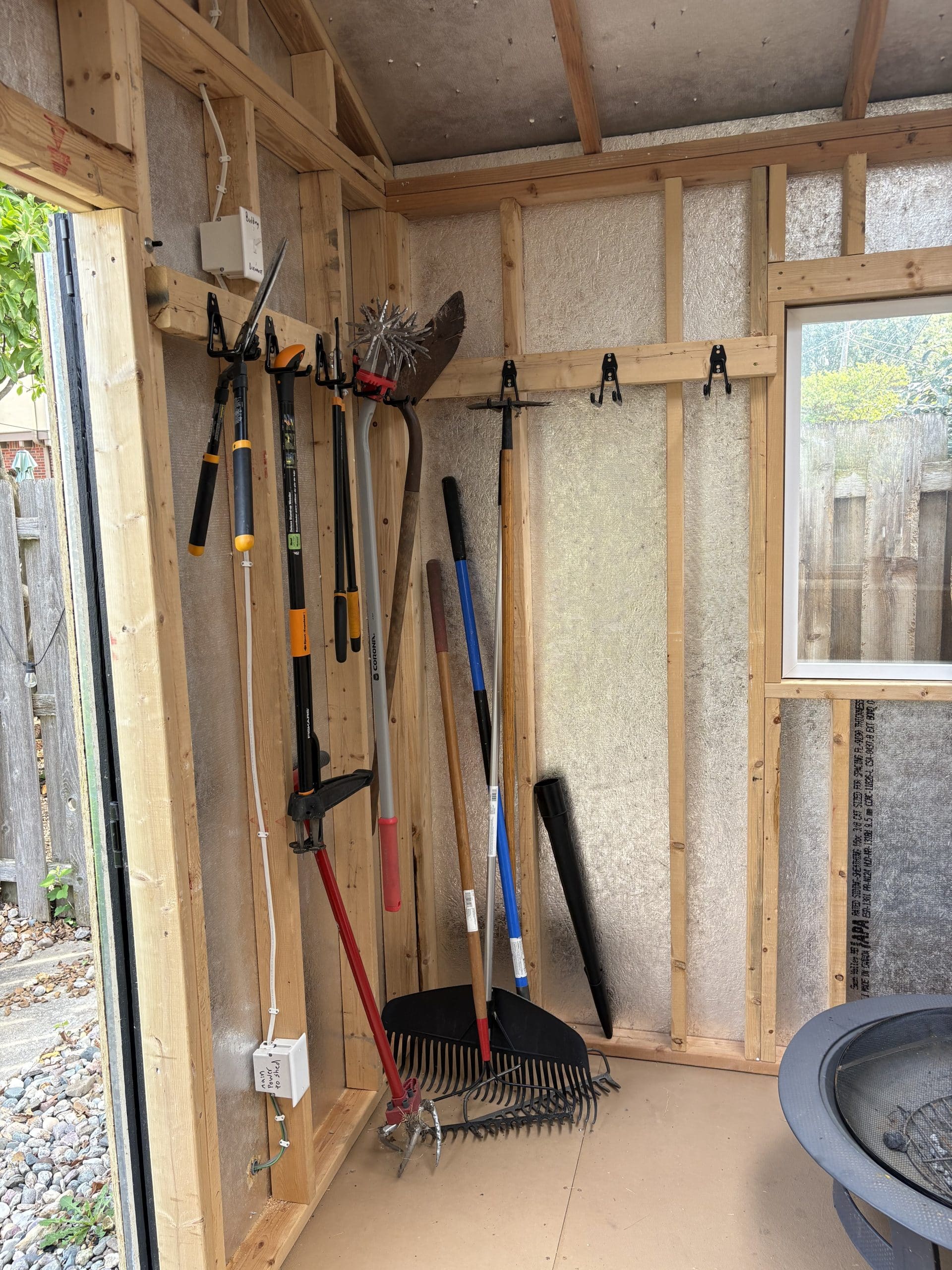 shed interior with custom storage solutions for backyard organization in KCMO