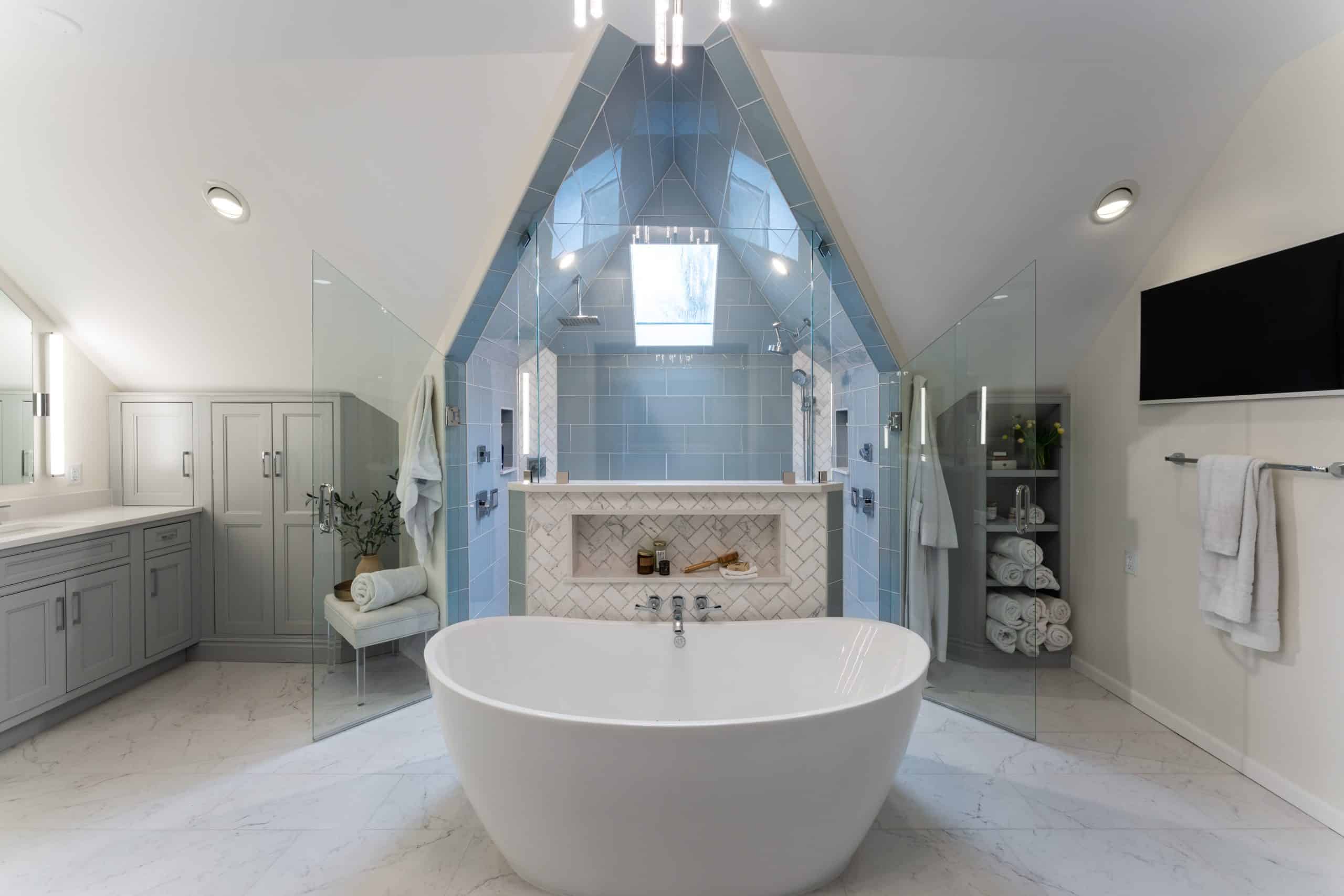 spa-like blue tile large walk-in shower with bench seating and niches and multiple shower heads in primary bathroom remodel in Kansas City spa-like blue tile large walk-in shower with bench seating and niches and multiple shower heads in primary bathroom remodel in Kansas City