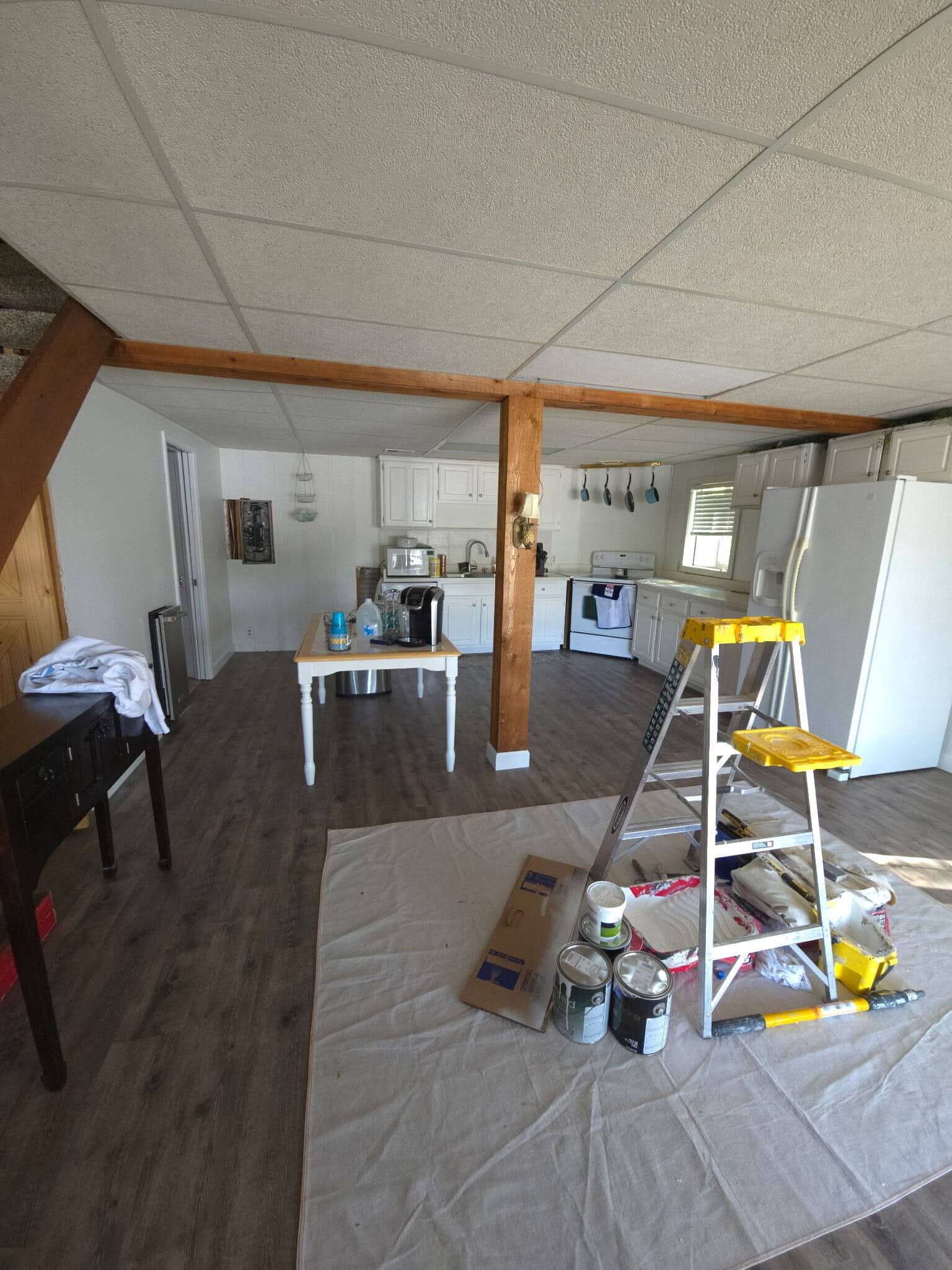 new trim and baseboards after installing LVT in lake of the ozarks home remodeling project