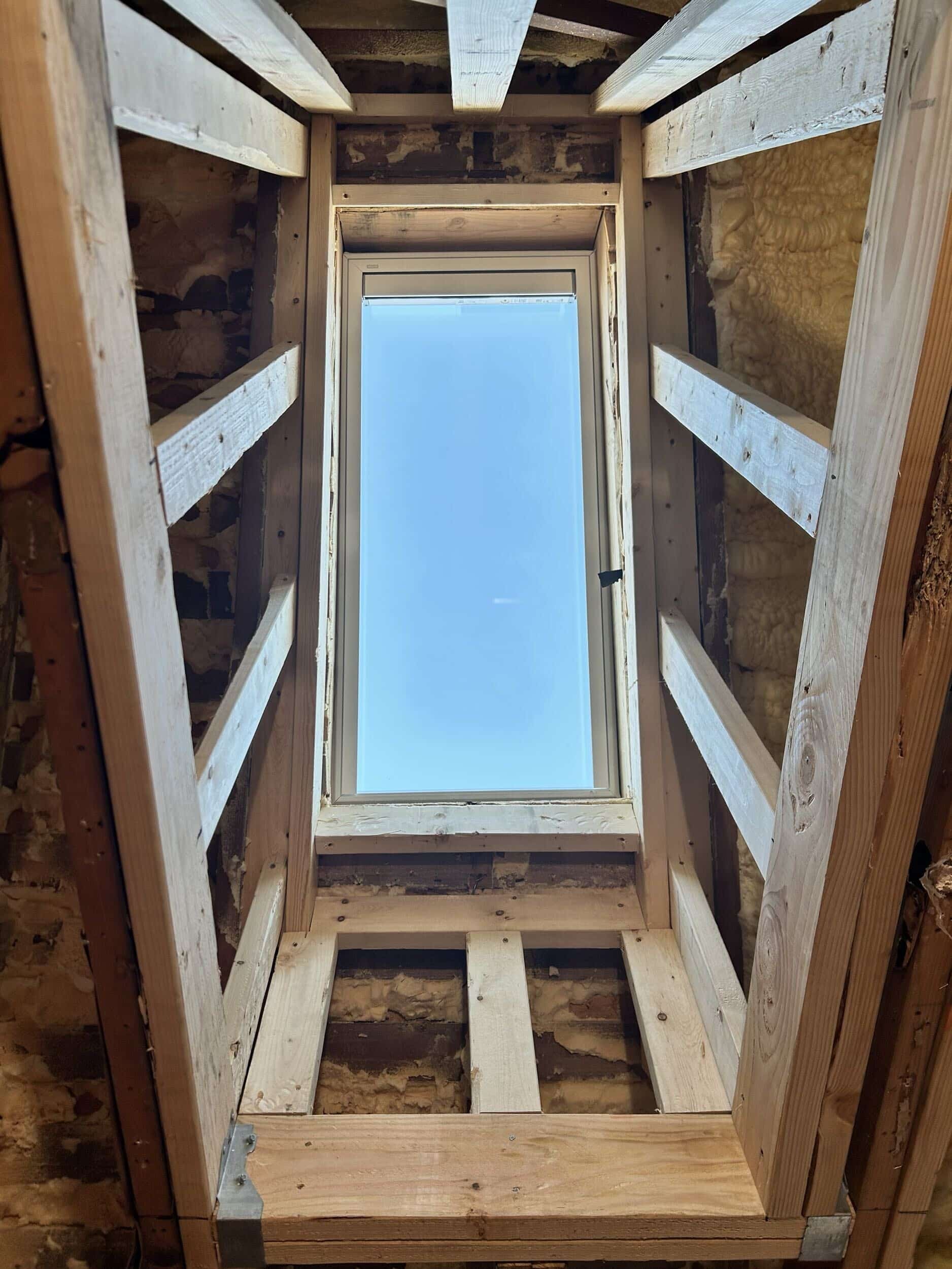 new skylight window installed in primary bathroom remodeling project new skylight window installed in primary bathroom remodeling project
