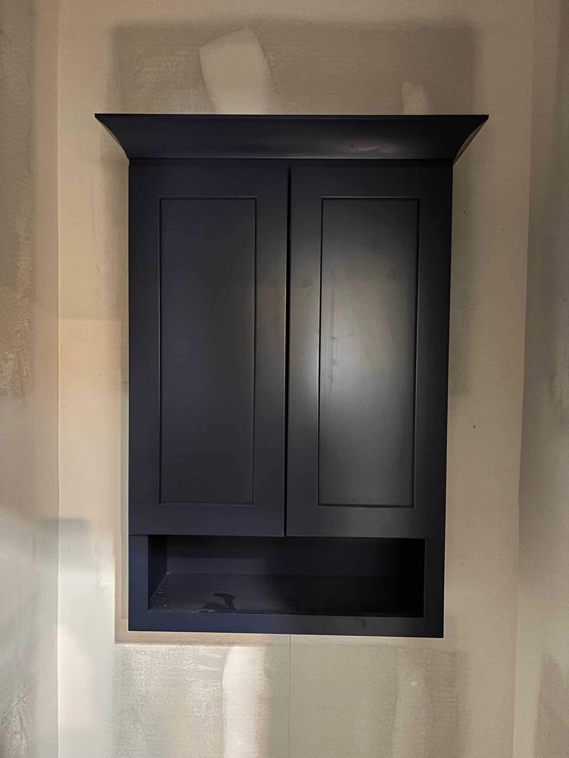 deep blue custom cabinetry for transitional primary bathroom remodel in Johnson County deep blue custom cabinetry for transitional primary bathroom remodel in Johnson County