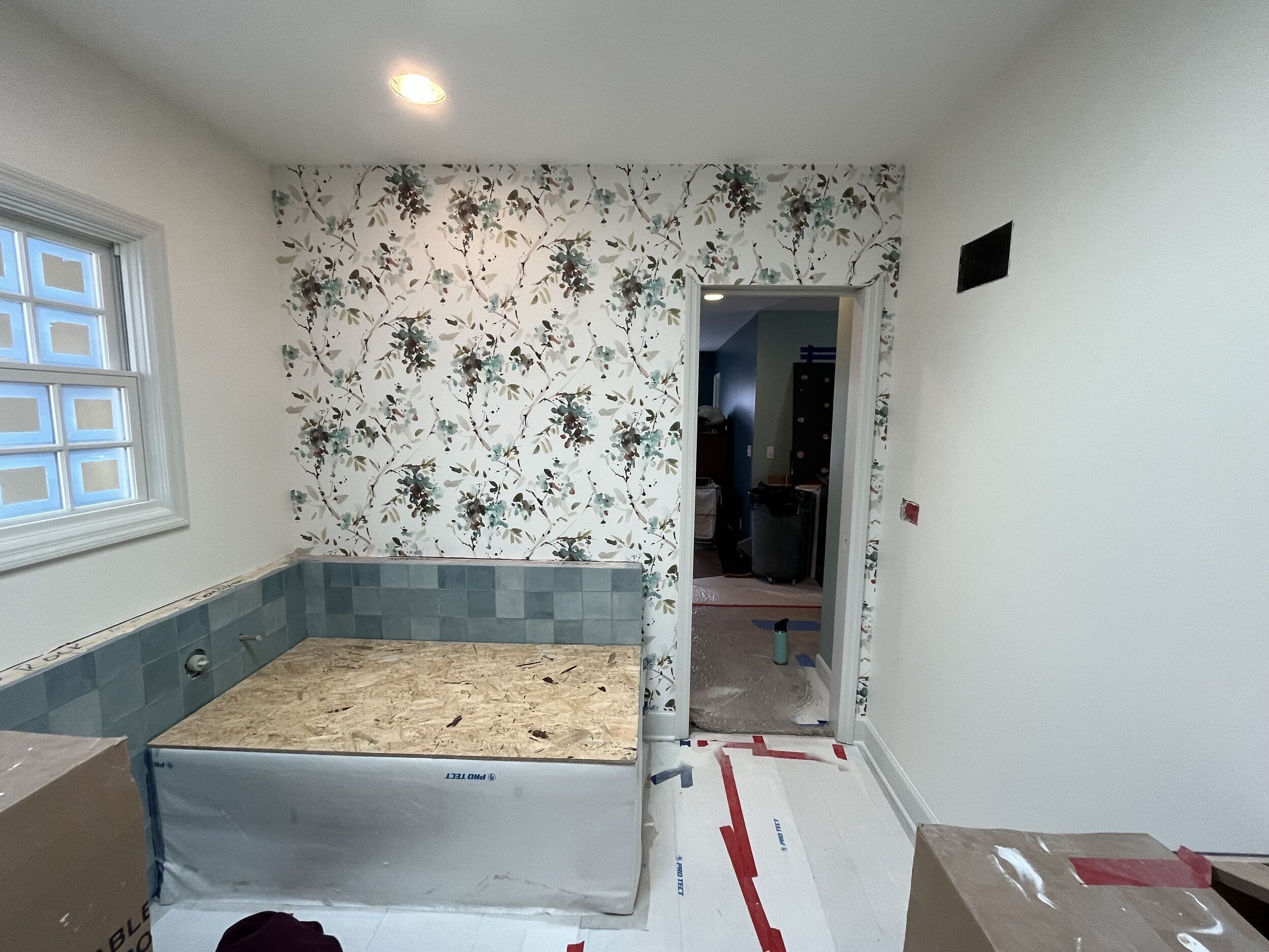 bath tub corner with wallpaper and tile details bath tub corner with wallpaper and tile details
