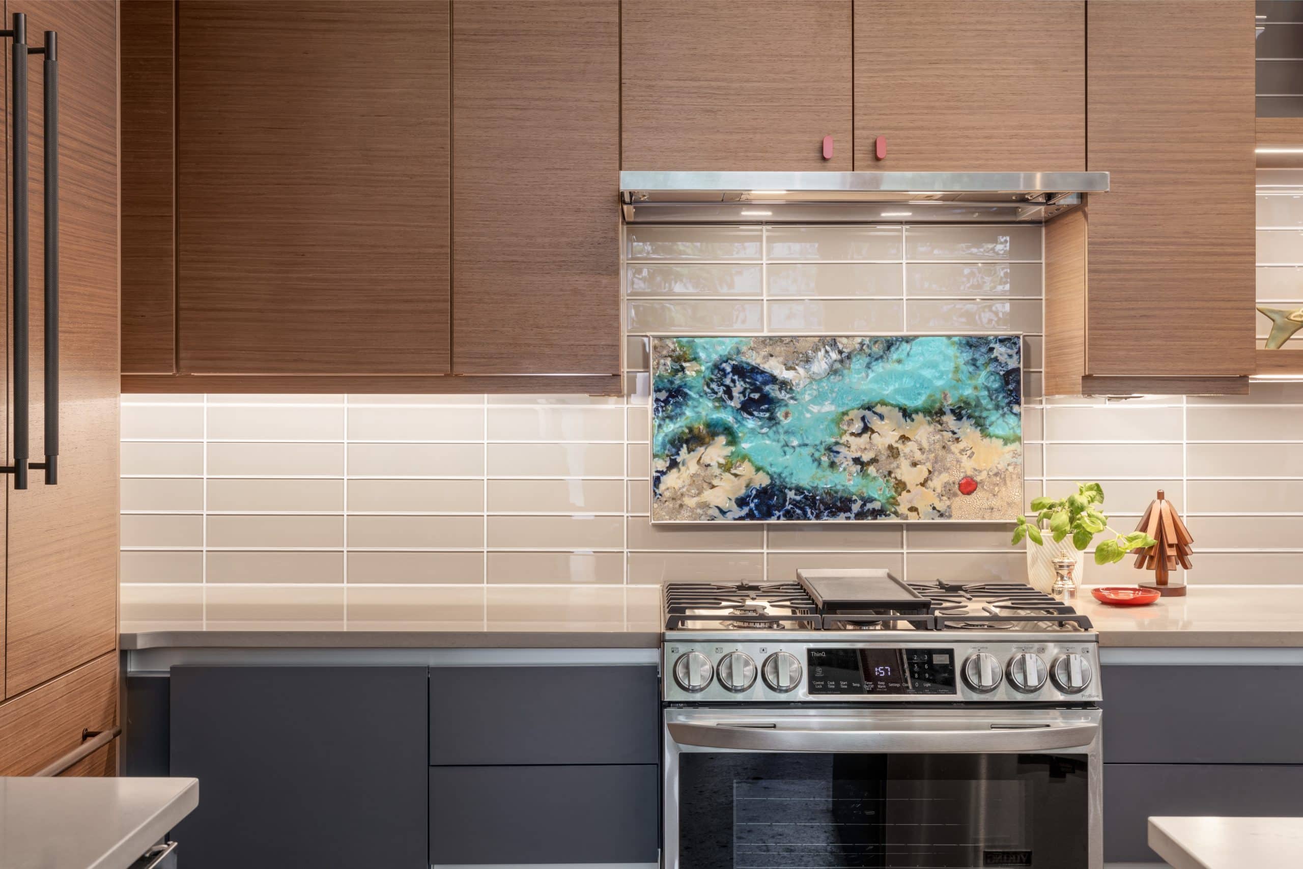 Custom kitchen backsplash featuring a tile collected by the homeowner during a trip to Italy Custom kitchen backsplash featuring a tile collected by the homeowner during a trip to Italy