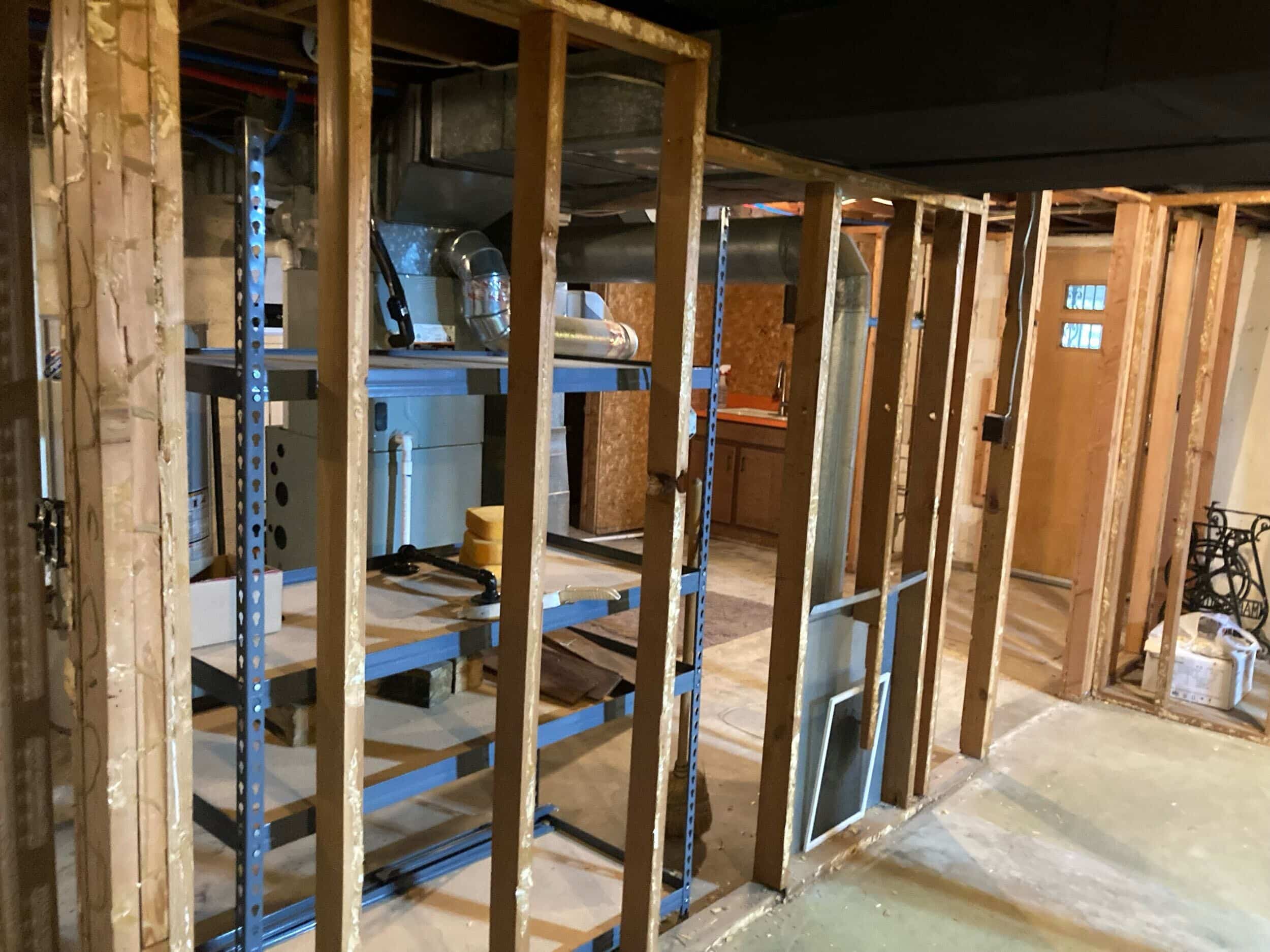 demo phase of Kansas City basement remodel by Schloegel