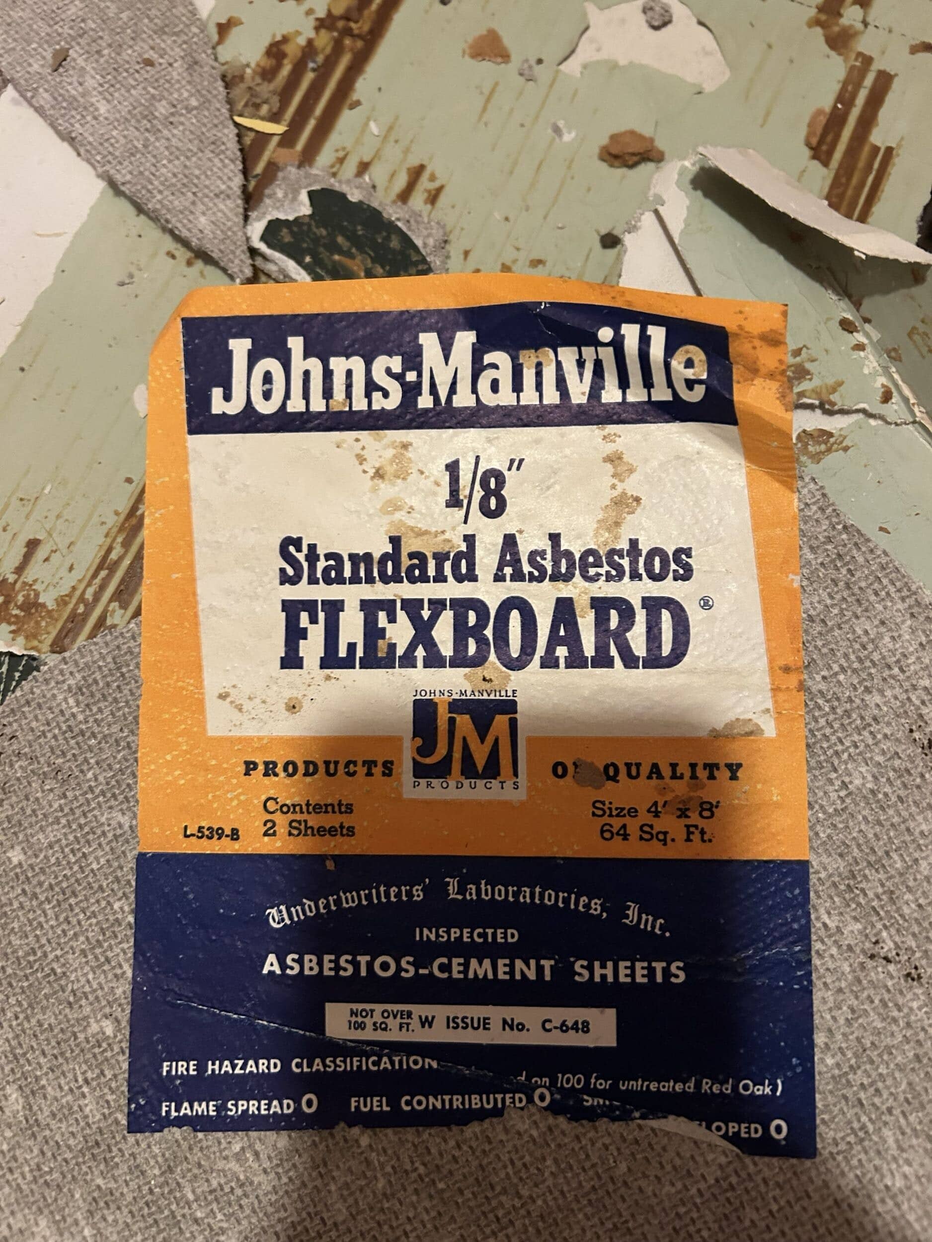 asbestos cement sheet found in demo of bathroom