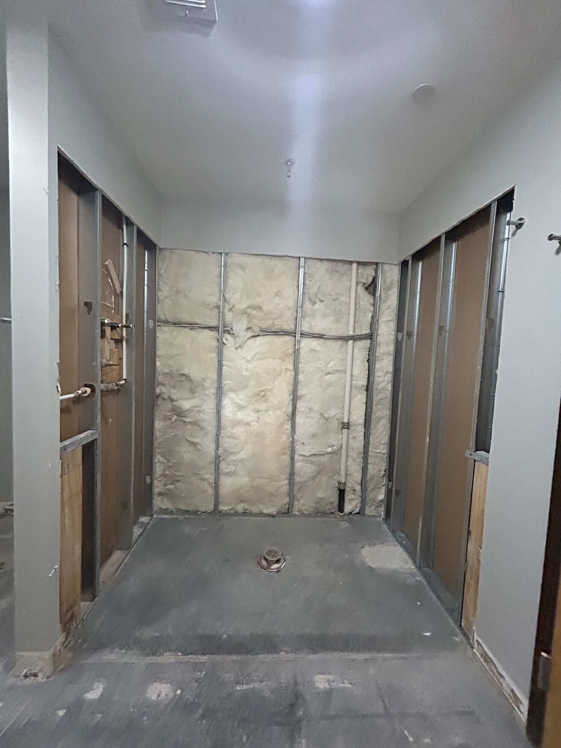 primary bath demo in KC condo remodel in Westport
