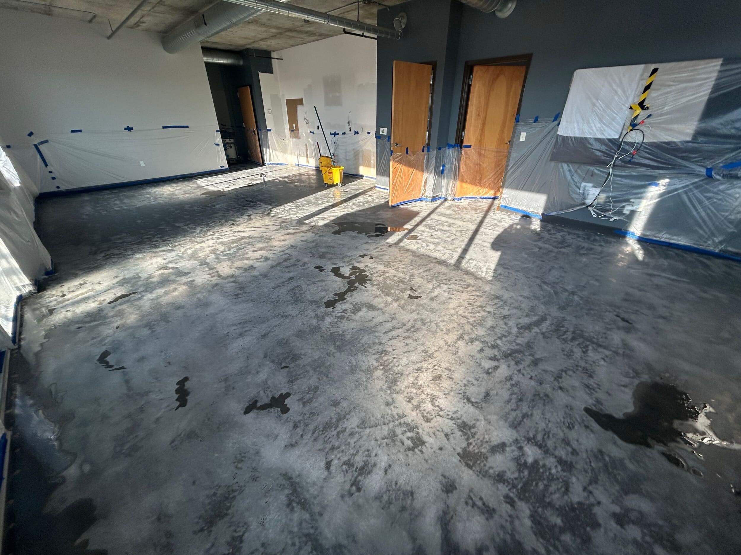 concrete floor urban look in KC condo remodel