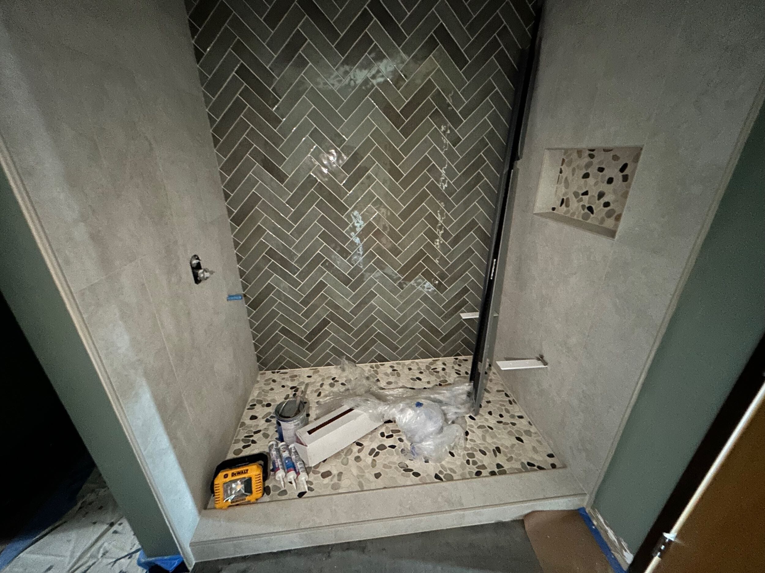 KC condo remodel construction phase  tile in primary bath 