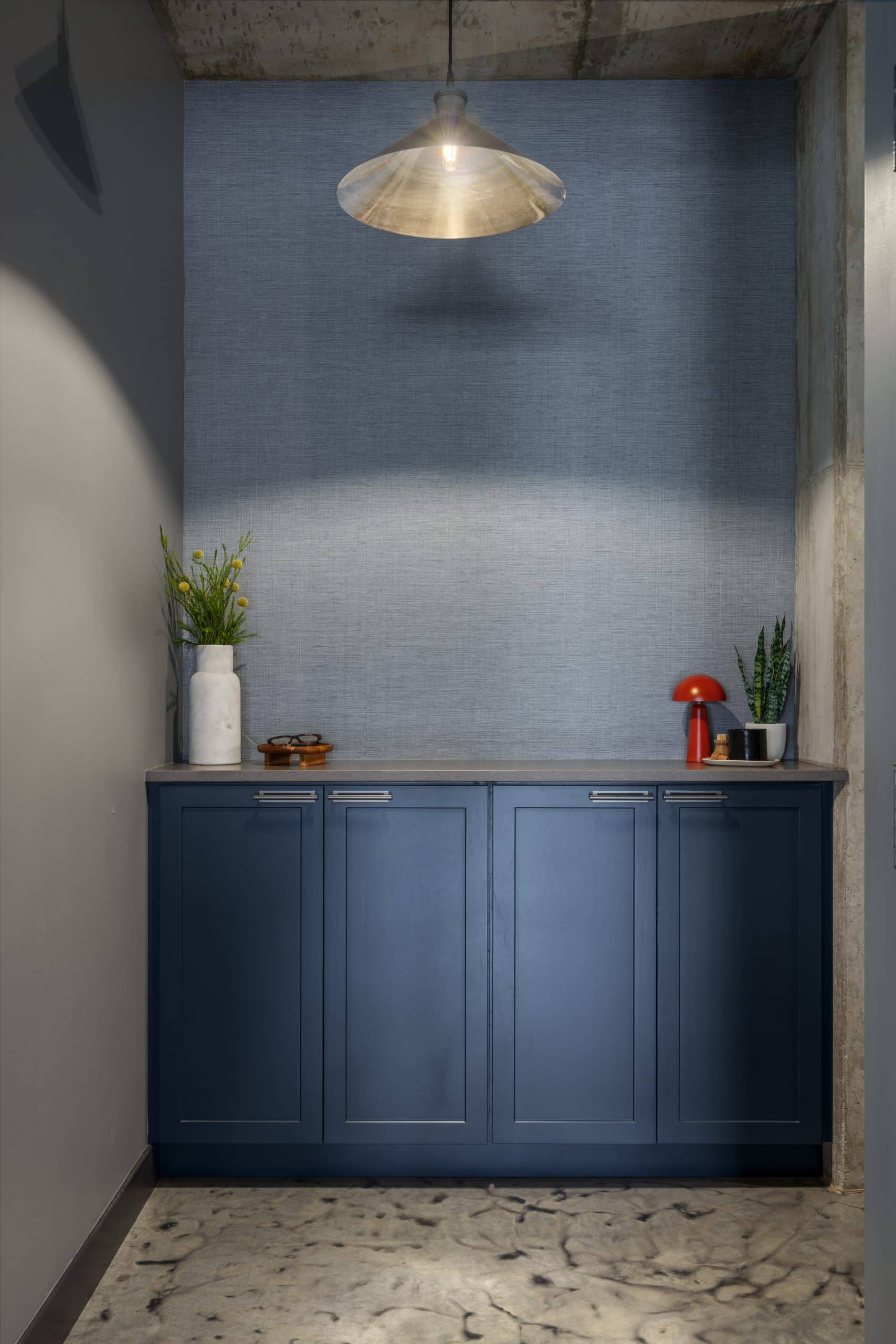 modern condo in Westport KC with entryway landing drop zone custom cabinetry