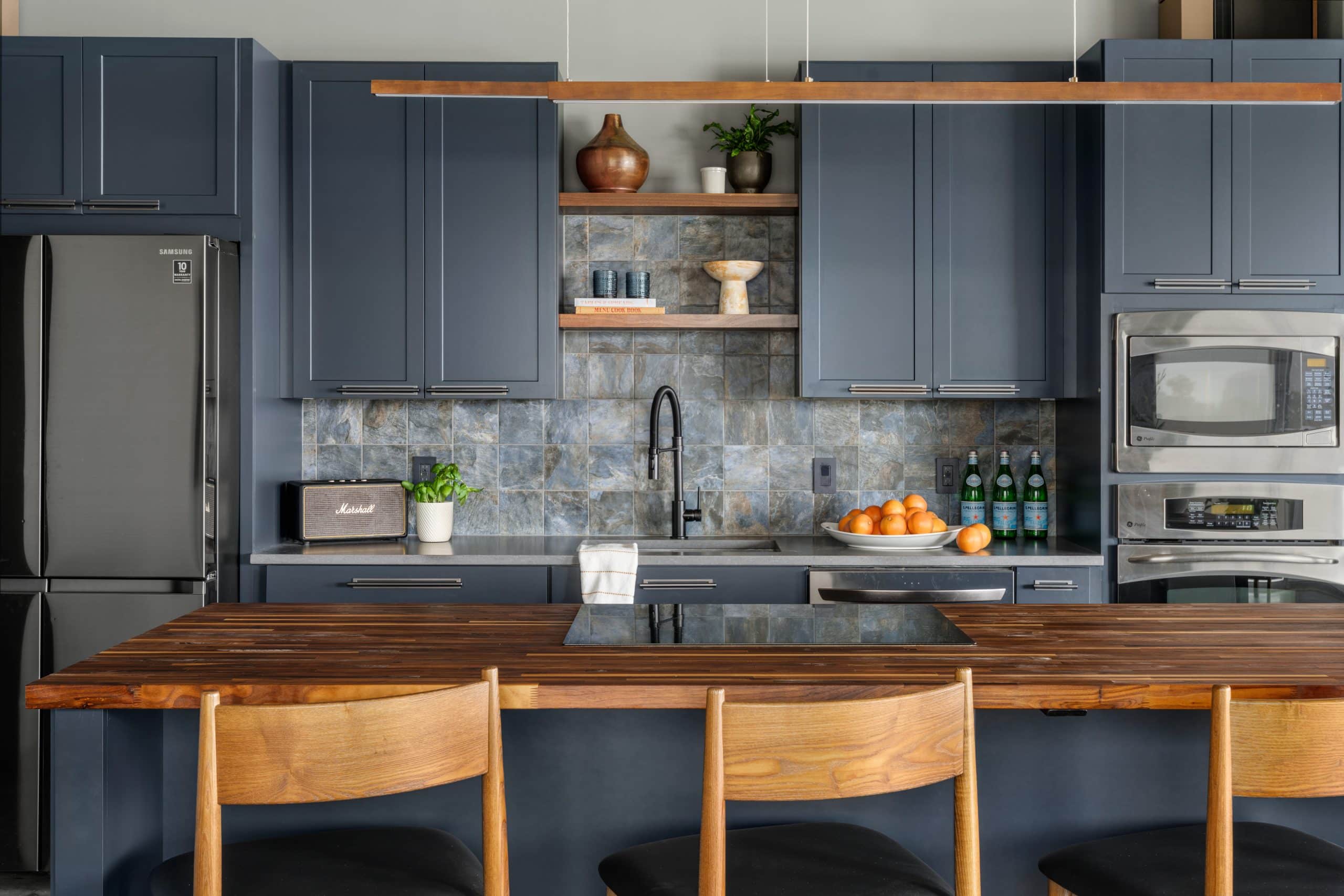 industrial moody but warm contemporary westport KCMO condo remodel by Schloegel handyman team